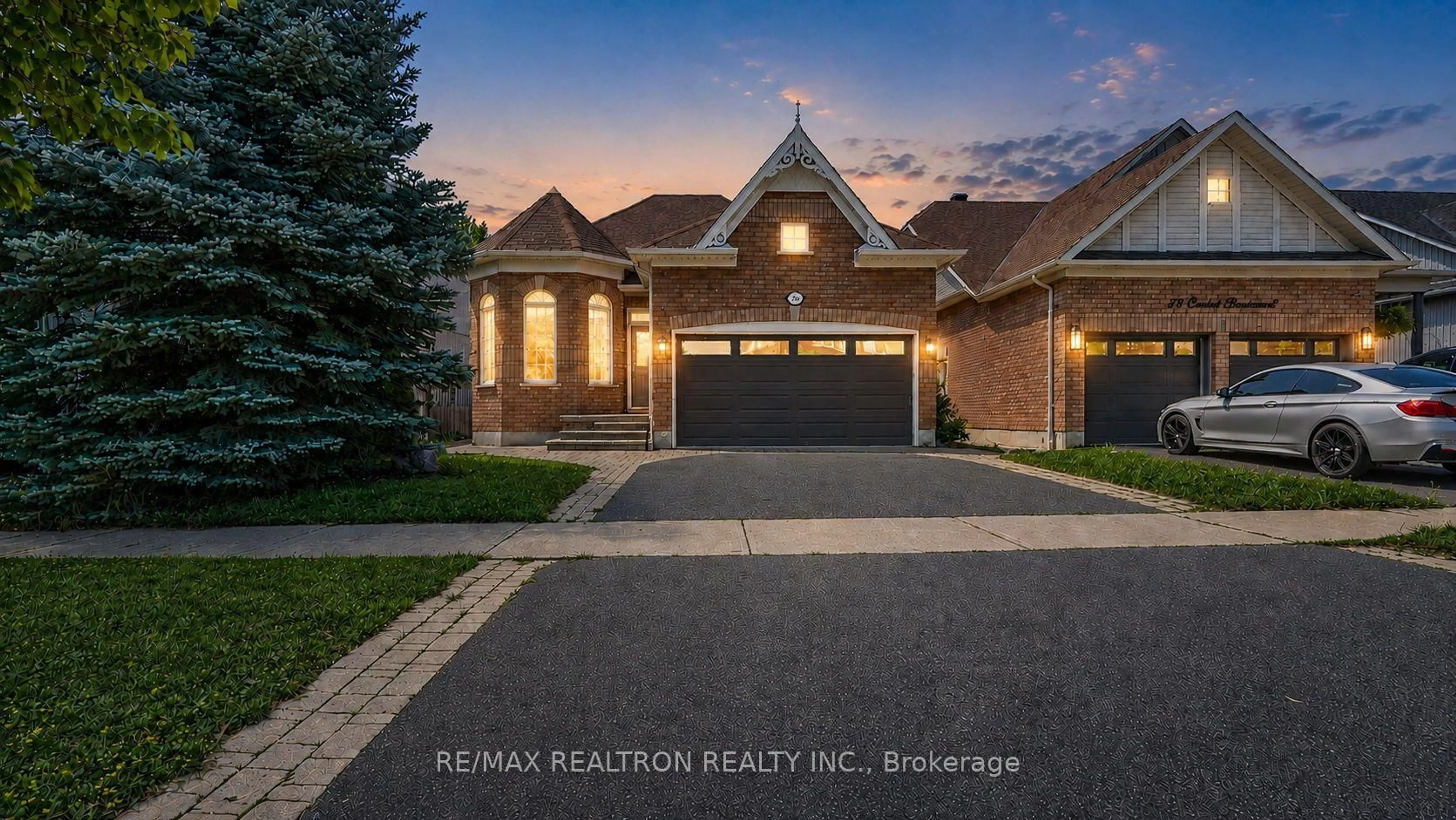Home with brick exterior material, street for 76 Cachet Blvd, Whitby Ontario L1M 2C9