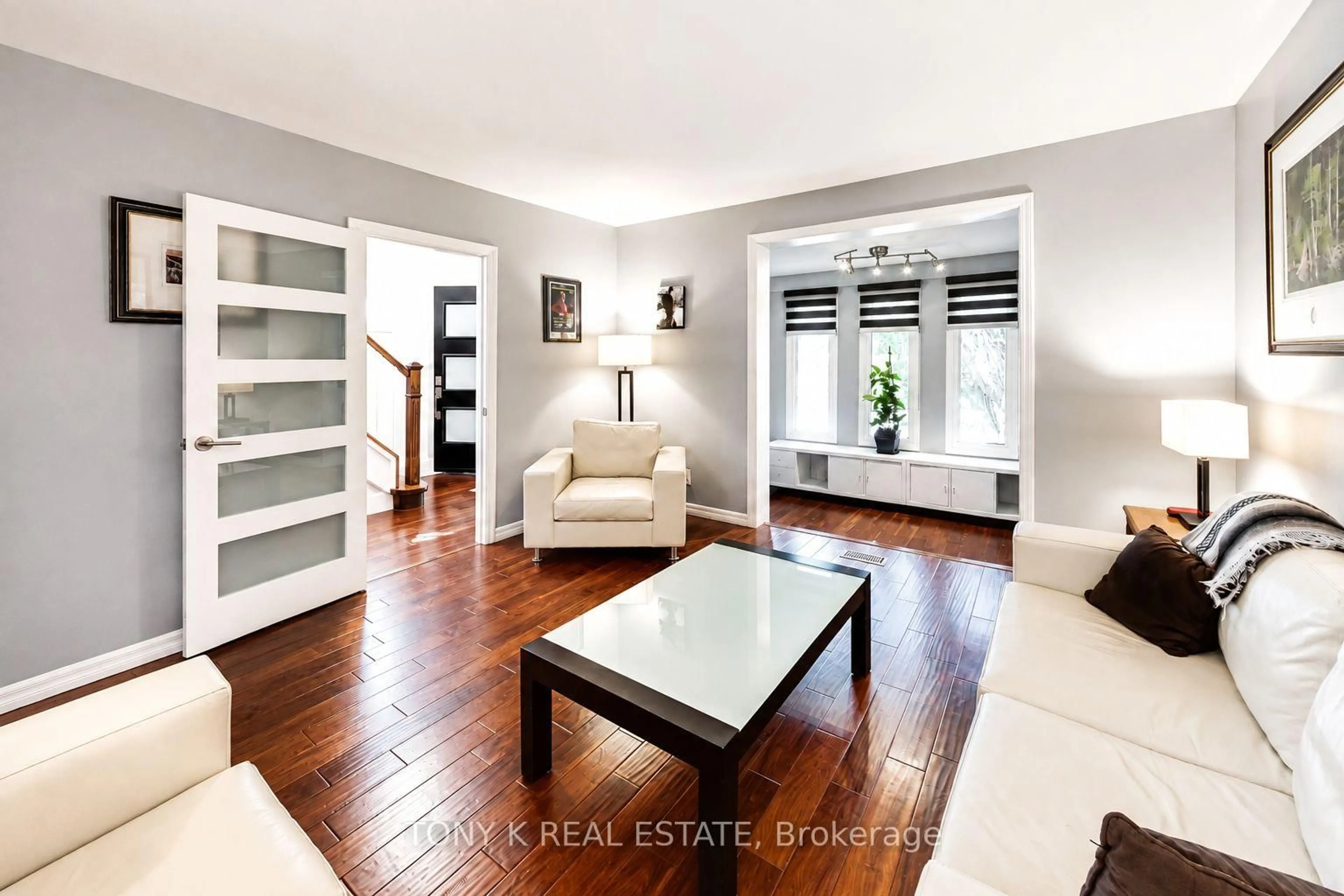Living room with furniture, wood/laminate floor for 111 Eastwood Ave, Toronto Ontario M1N 3H4
