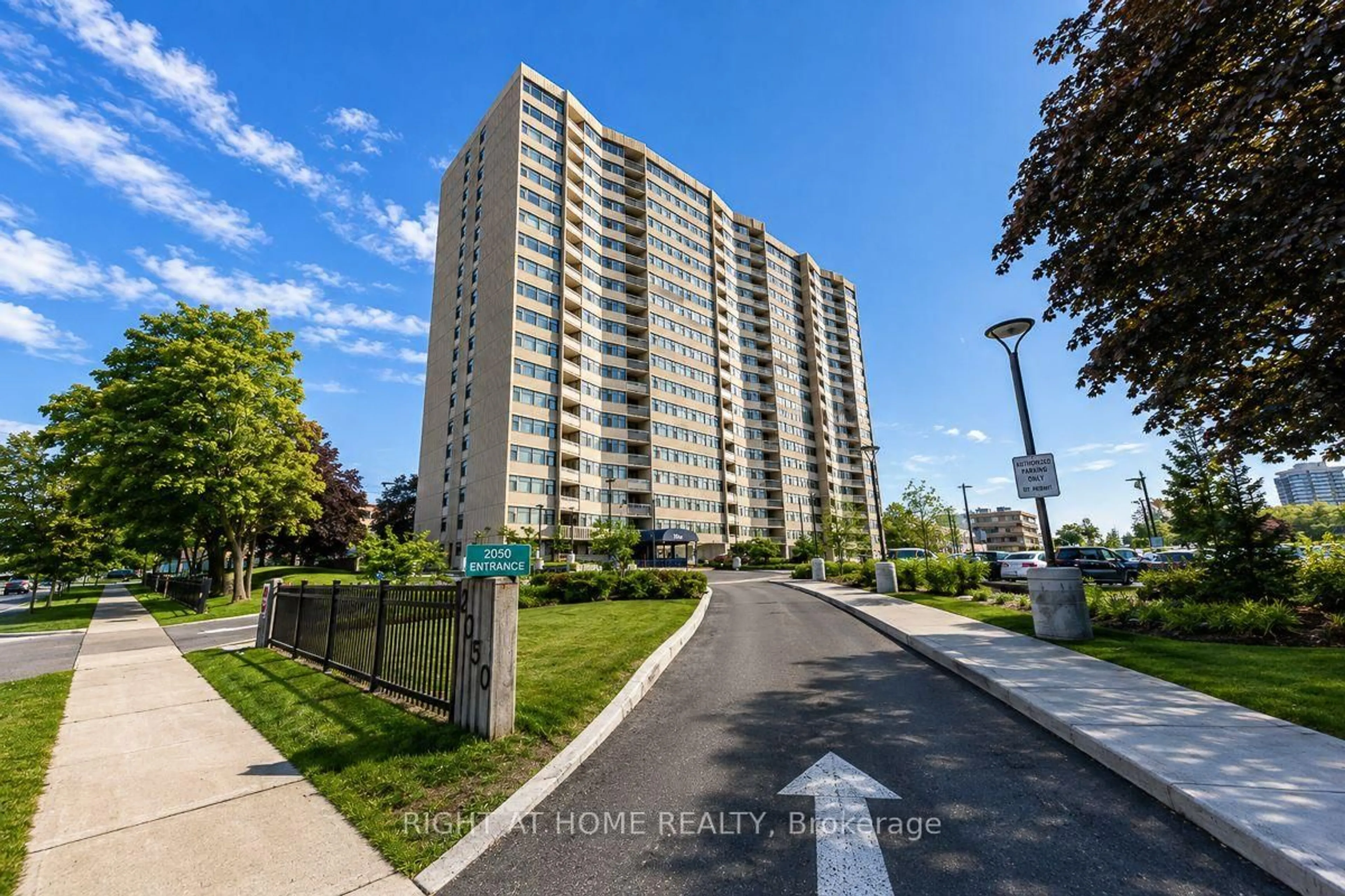 A pic from outside/outdoor area/front of a property/back of a property/a pic from drone, street for 2050 Bridletowne Circ #209, Toronto Ontario M1W 2V5