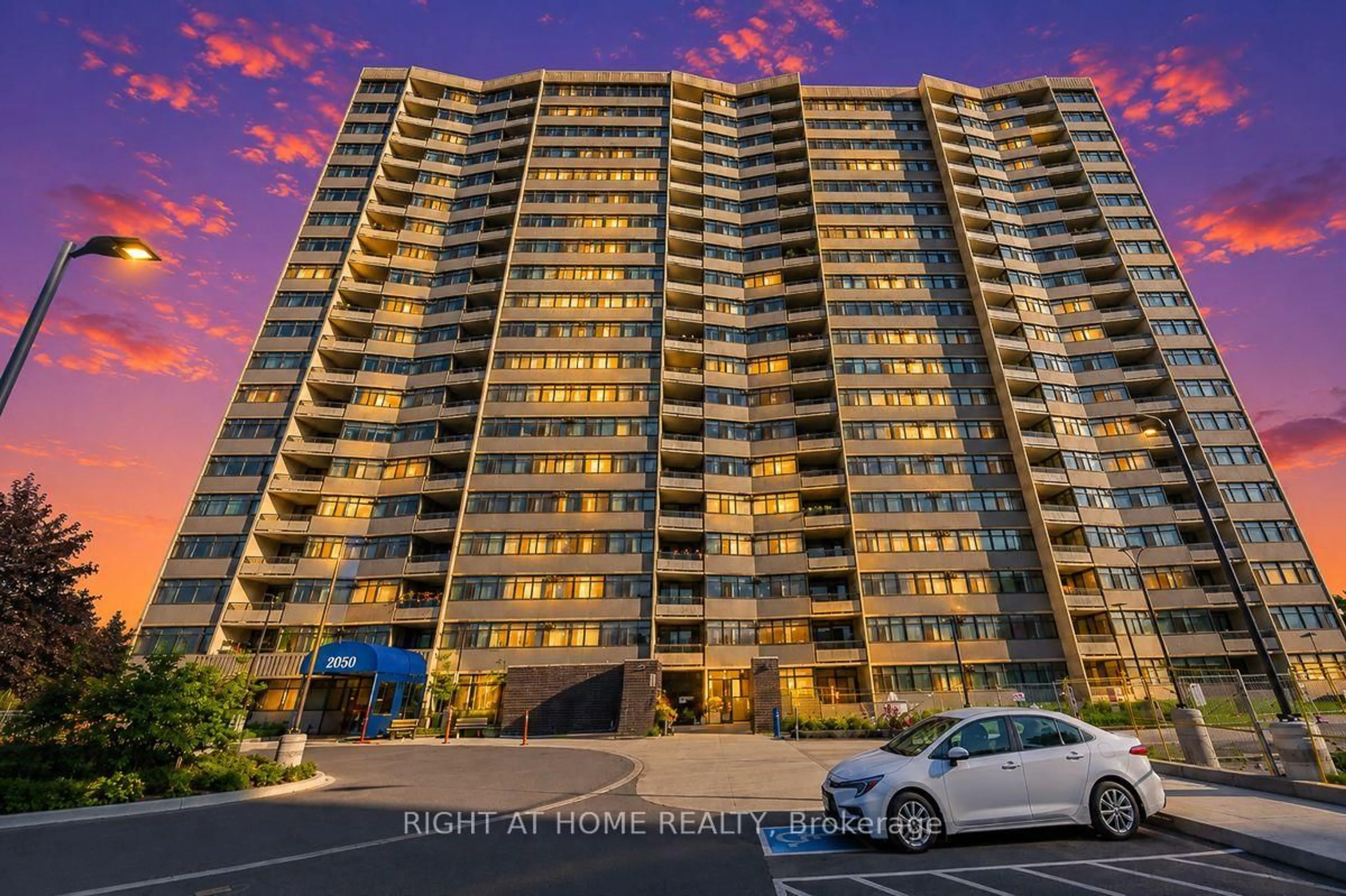 A pic from outside/outdoor area/front of a property/back of a property/a pic from drone, unknown for 2050 Bridletowne Circ #209, Toronto Ontario M1W 2V5