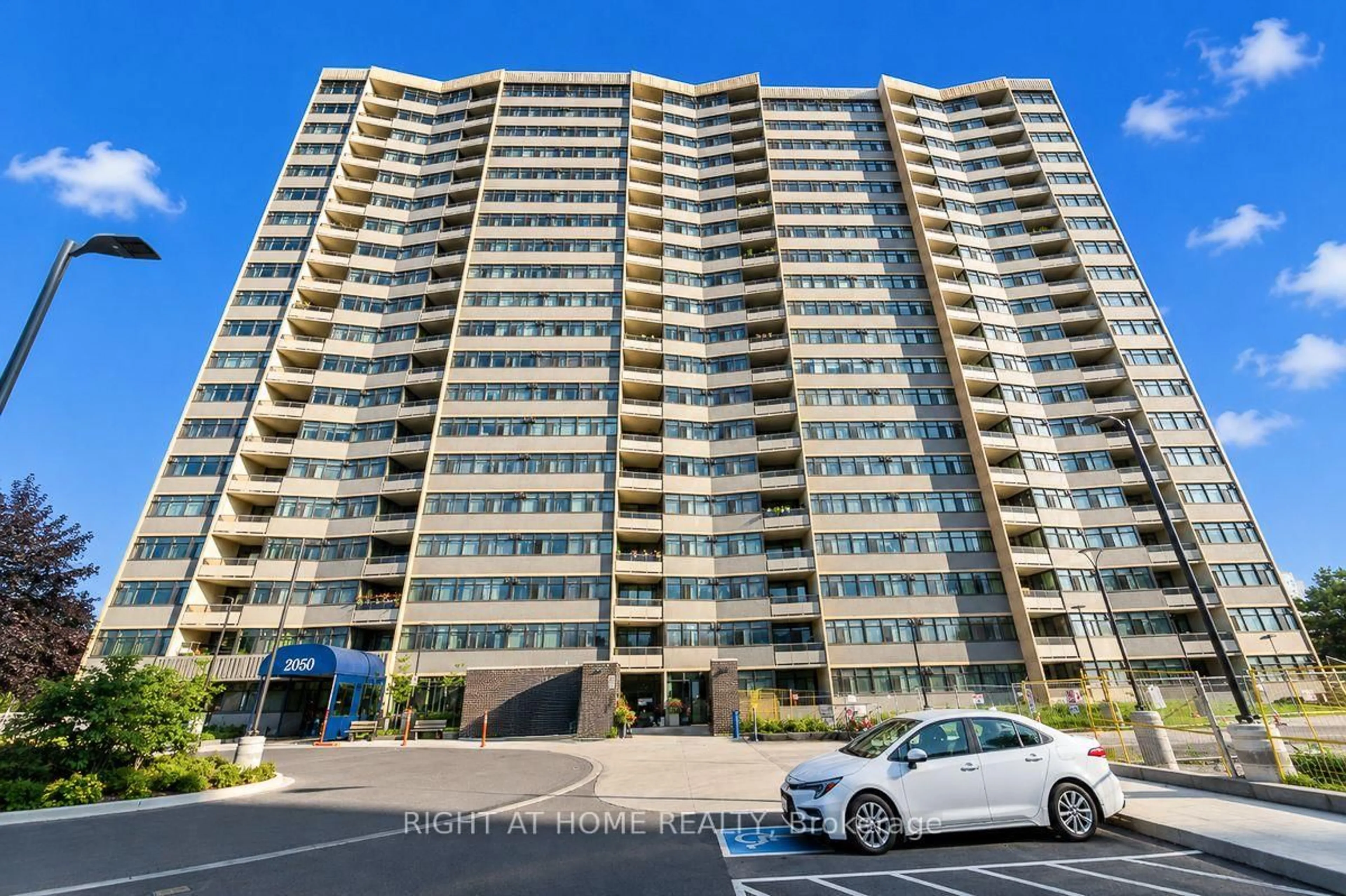 A pic from outside/outdoor area/front of a property/back of a property/a pic from drone, unknown for 2050 Bridletowne Circ #209, Toronto Ontario M1W 2V5