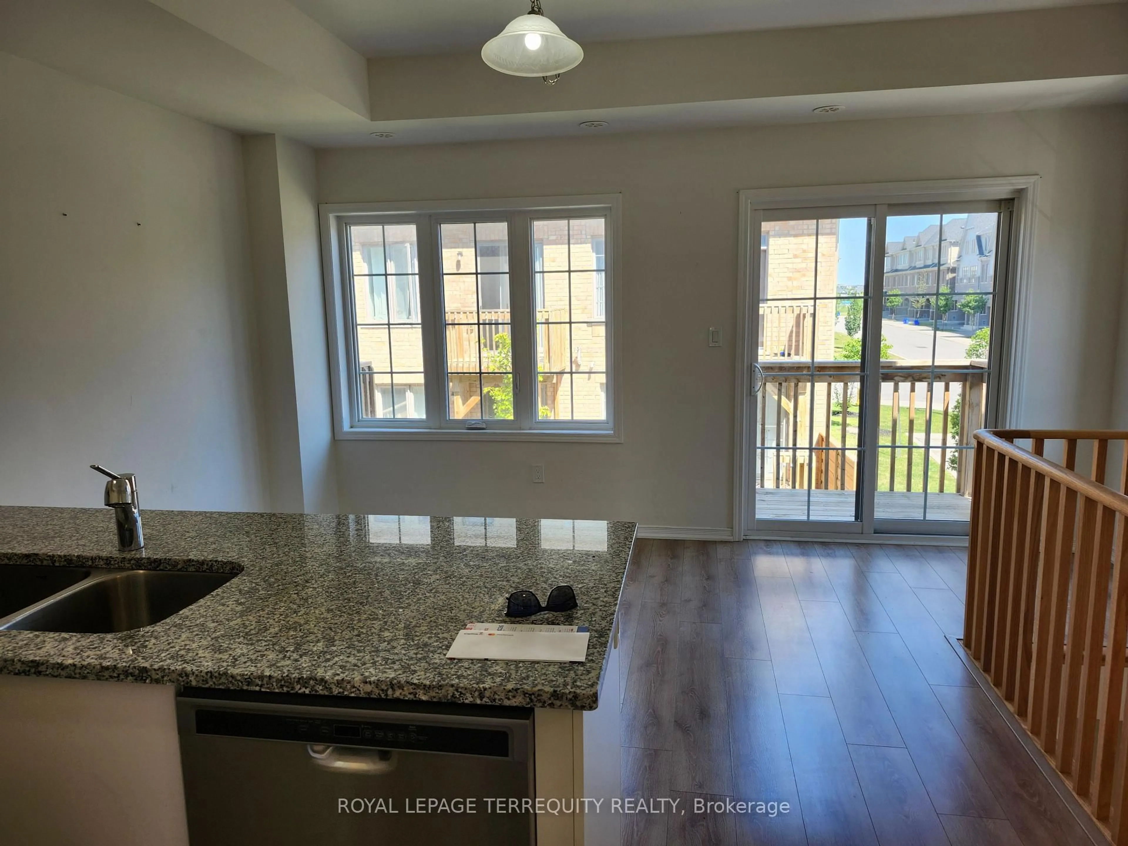 Open concept kitchen, wood/laminate floor for 2551 Barbarolli Path #115, Oshawa Ontario L1L 0P9
