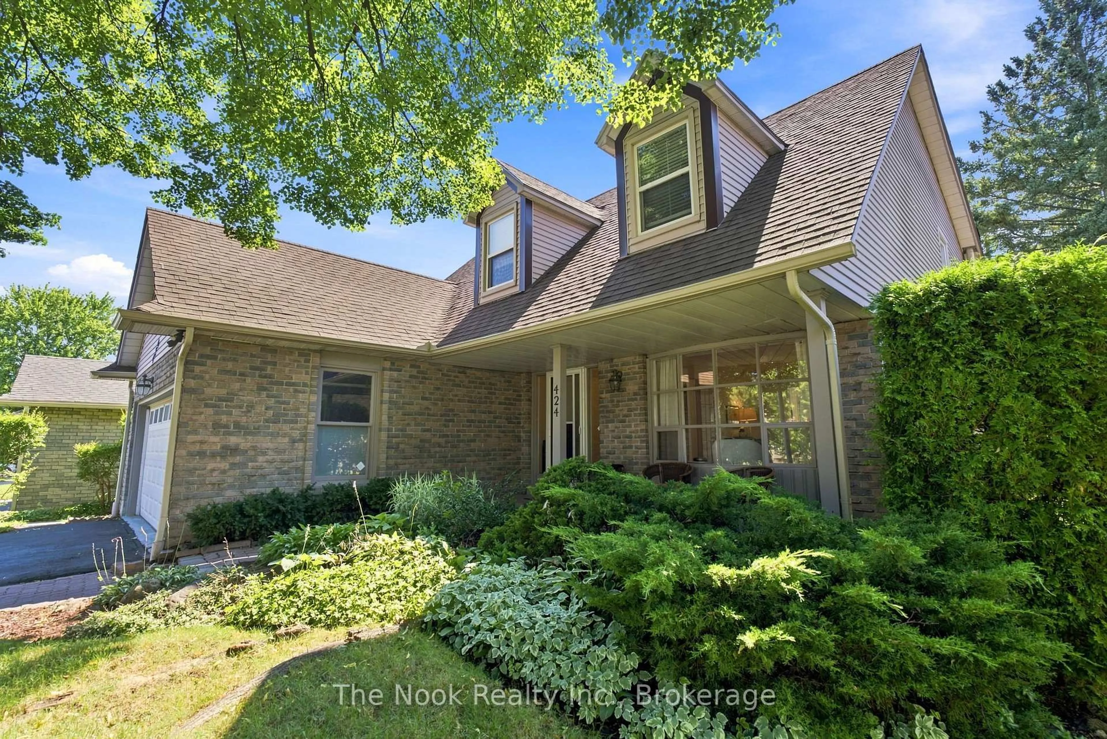 Home with brick exterior material, street for 424 Prince Of Wales Dr, Whitby Ontario L1N 6M9