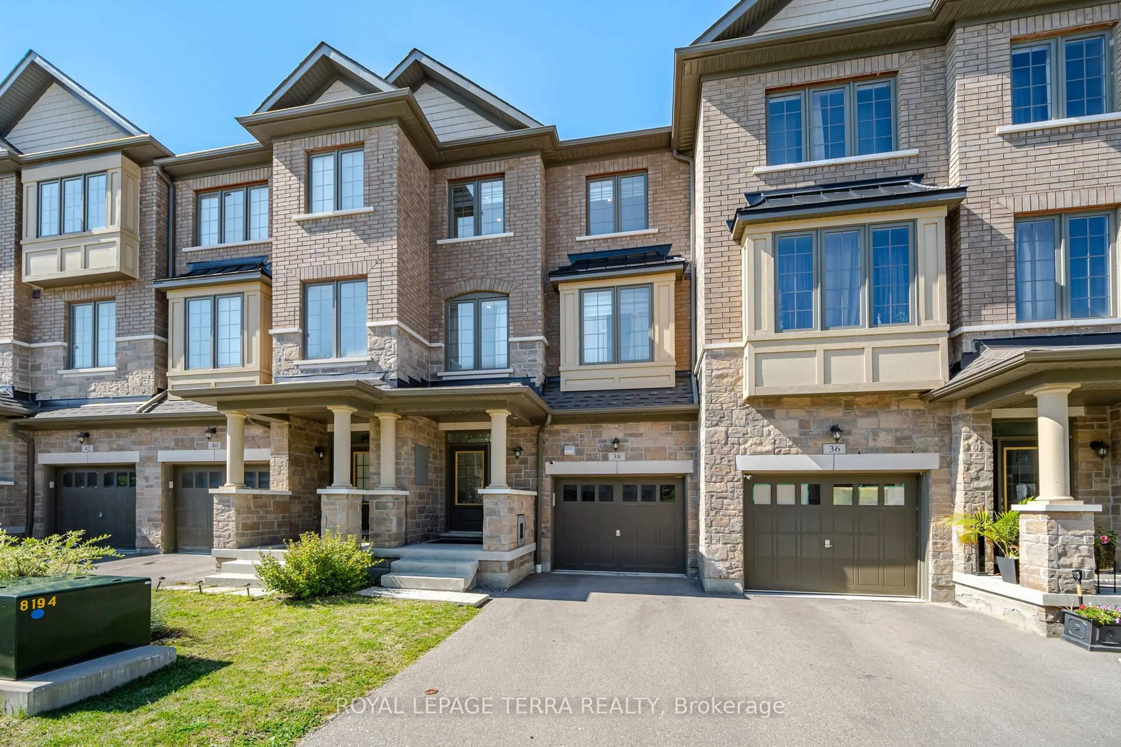 Home with brick exterior material, street for 38 Hallmark Way, Whitby Ontario L1P 0K2