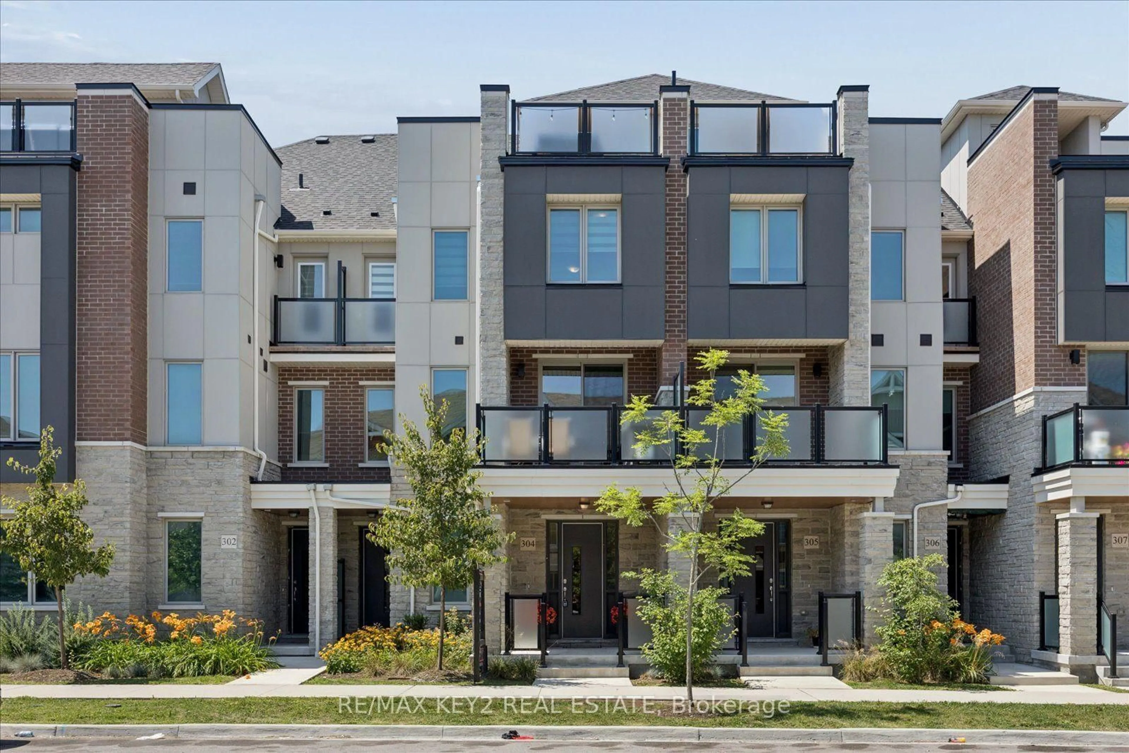 Home with brick exterior material, street for 1034 Reflection Pl #304, Pickering Ontario L1X 0L1