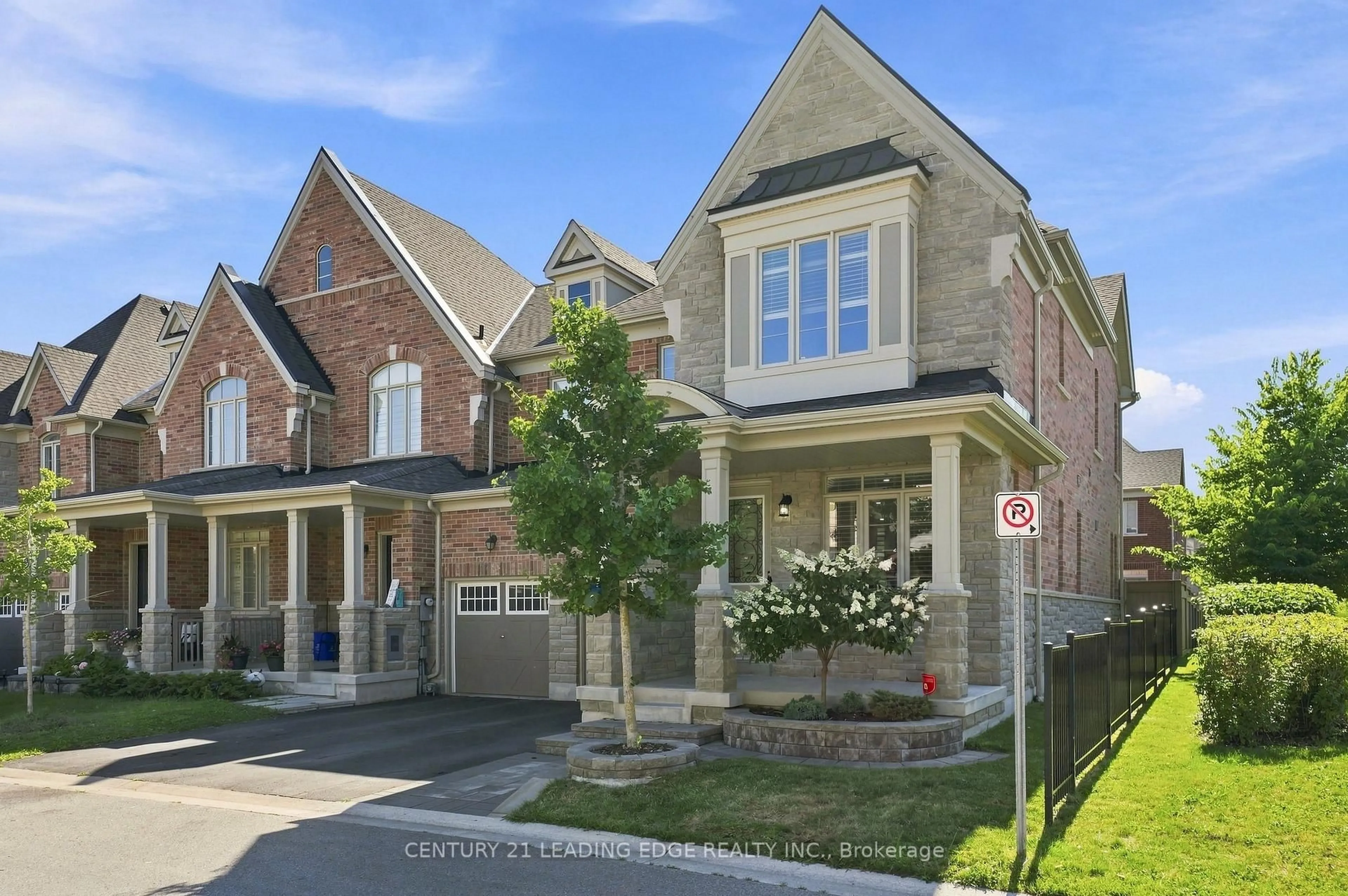 Home with brick exterior material, street for 42 Workmens Circ, Ajax Ontario L1T 0N7