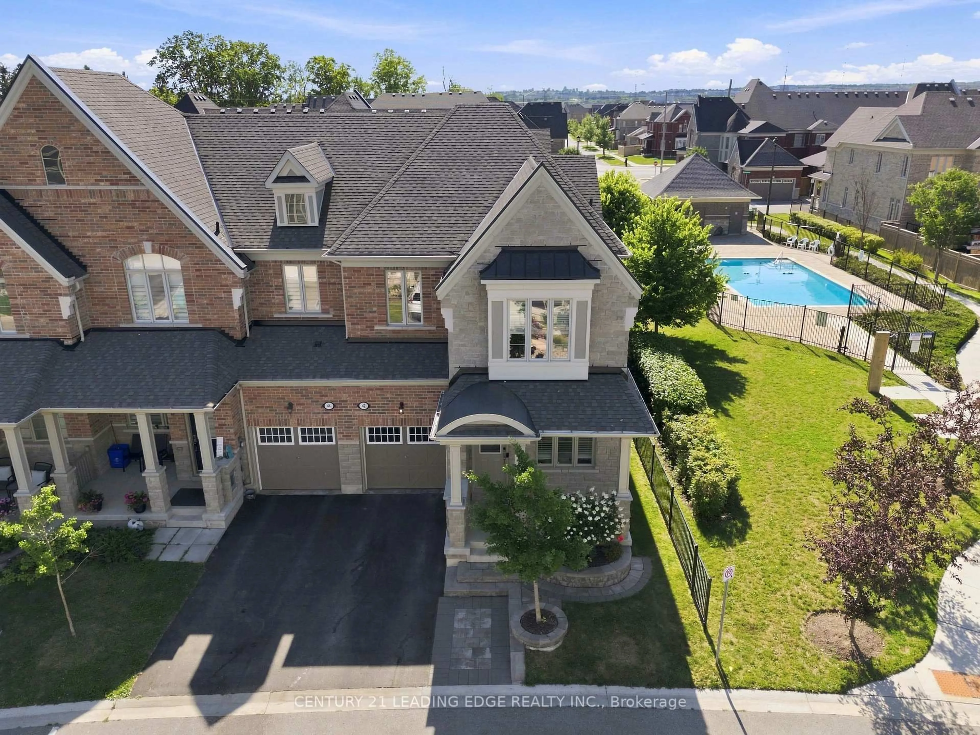 A pic from outside/outdoor area/front of a property/back of a property/a pic from drone, street for 42 Workmens Circ, Ajax Ontario L1T 0N7