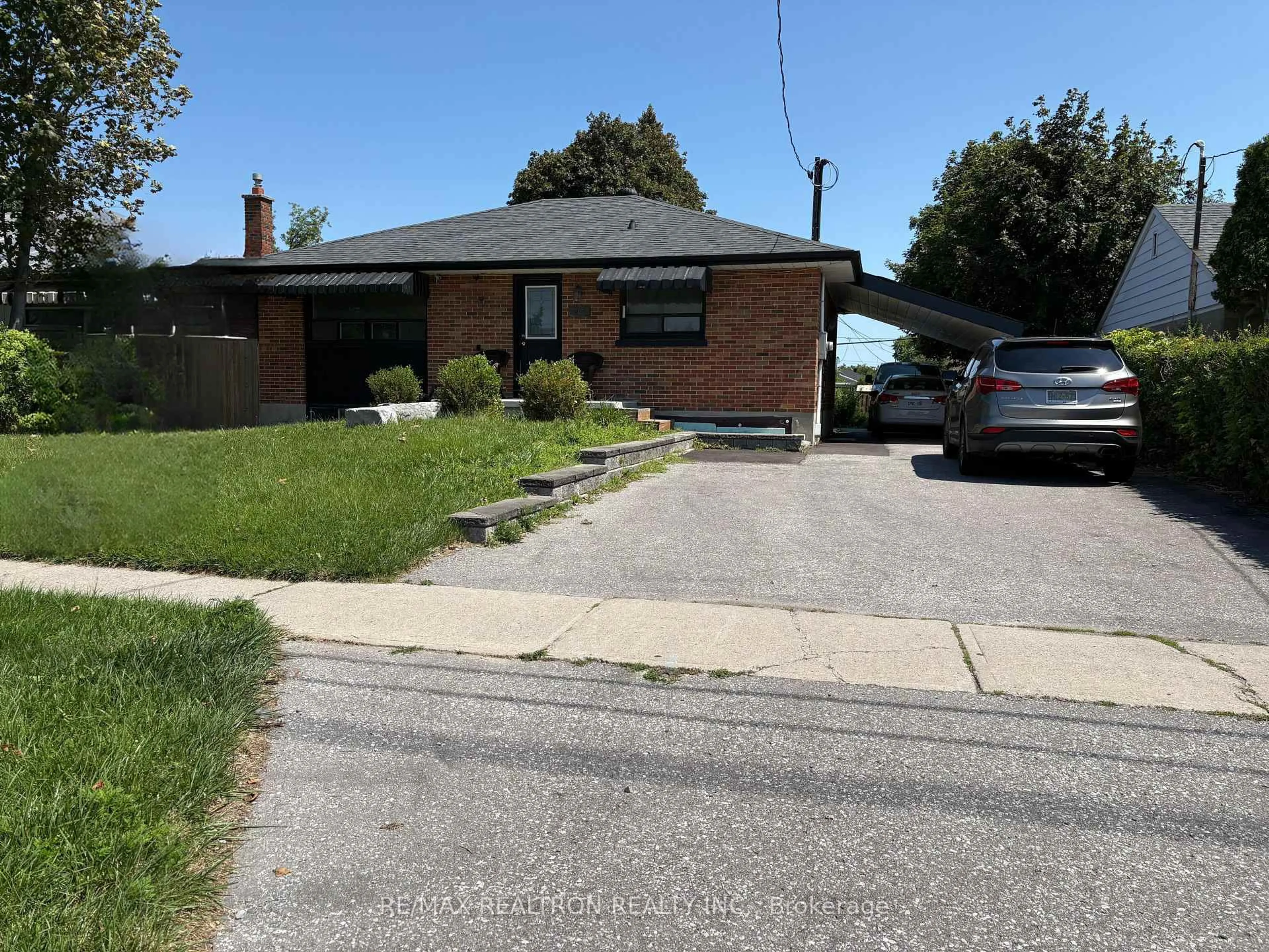 Home with brick exterior material, street for 607 Stevenson Rd, Oshawa Ontario L1J 5P2