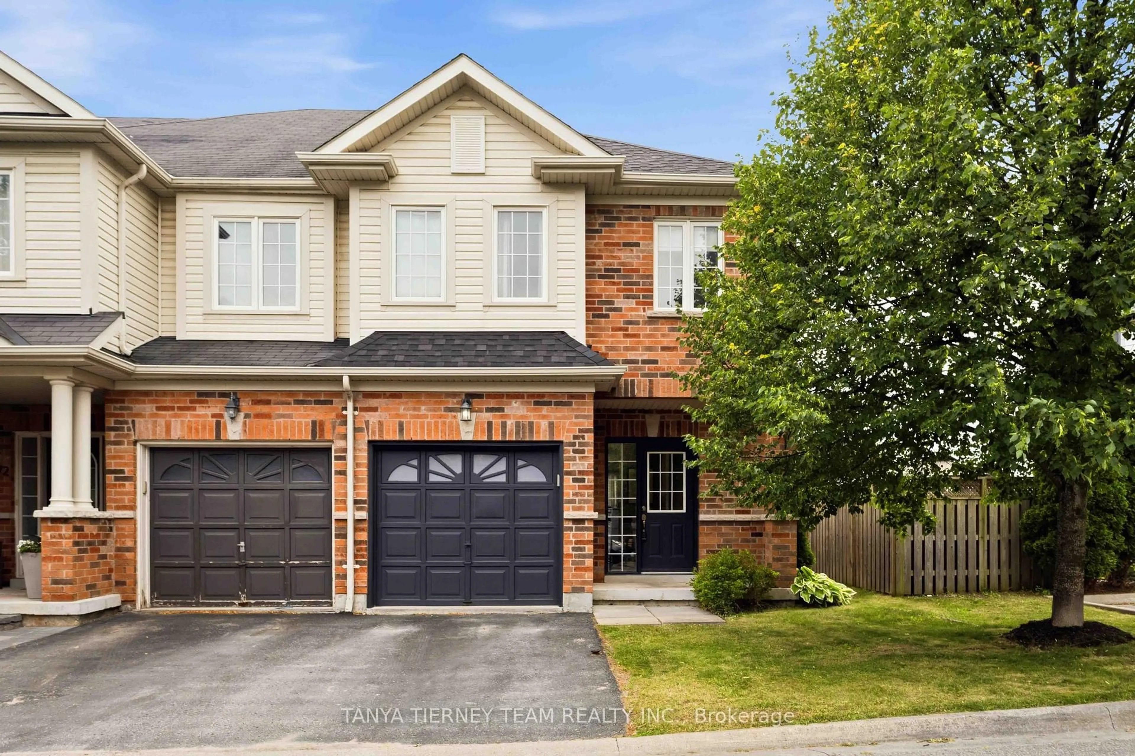 Home with brick exterior material, street for 70 Tempo Way, Whitby Ontario L1M 1B7