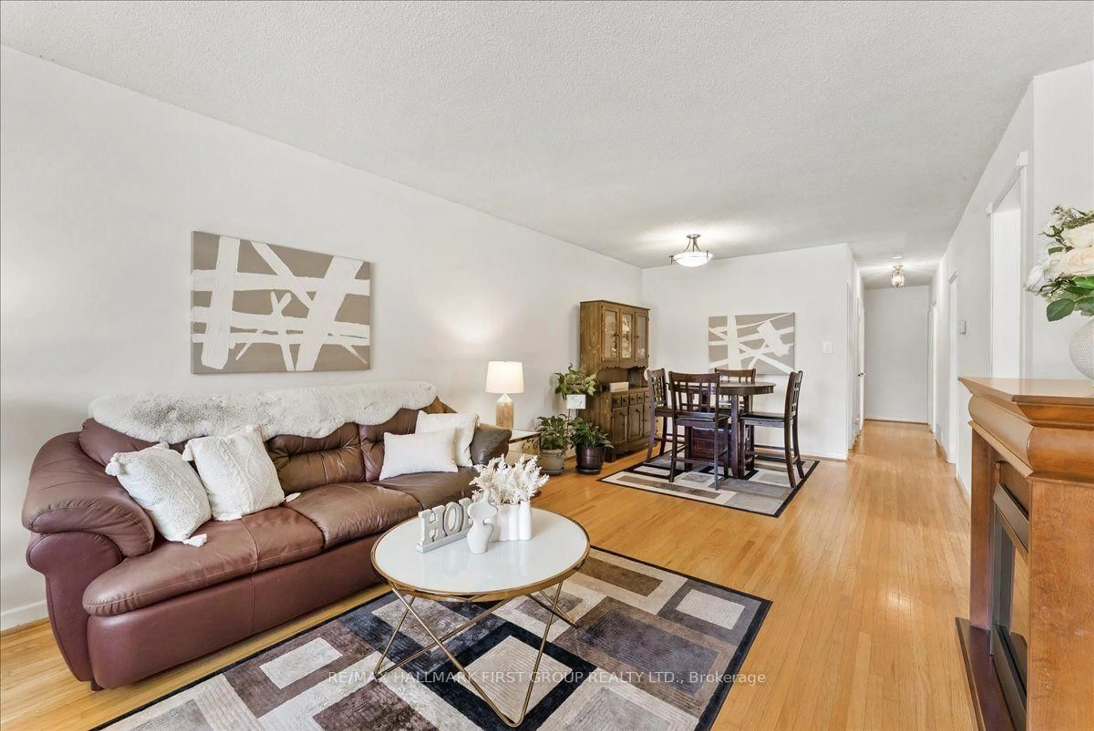 Living room with furniture, wood/laminate floor for 1387 Tatra Dr, Pickering Ontario L1W 1K7