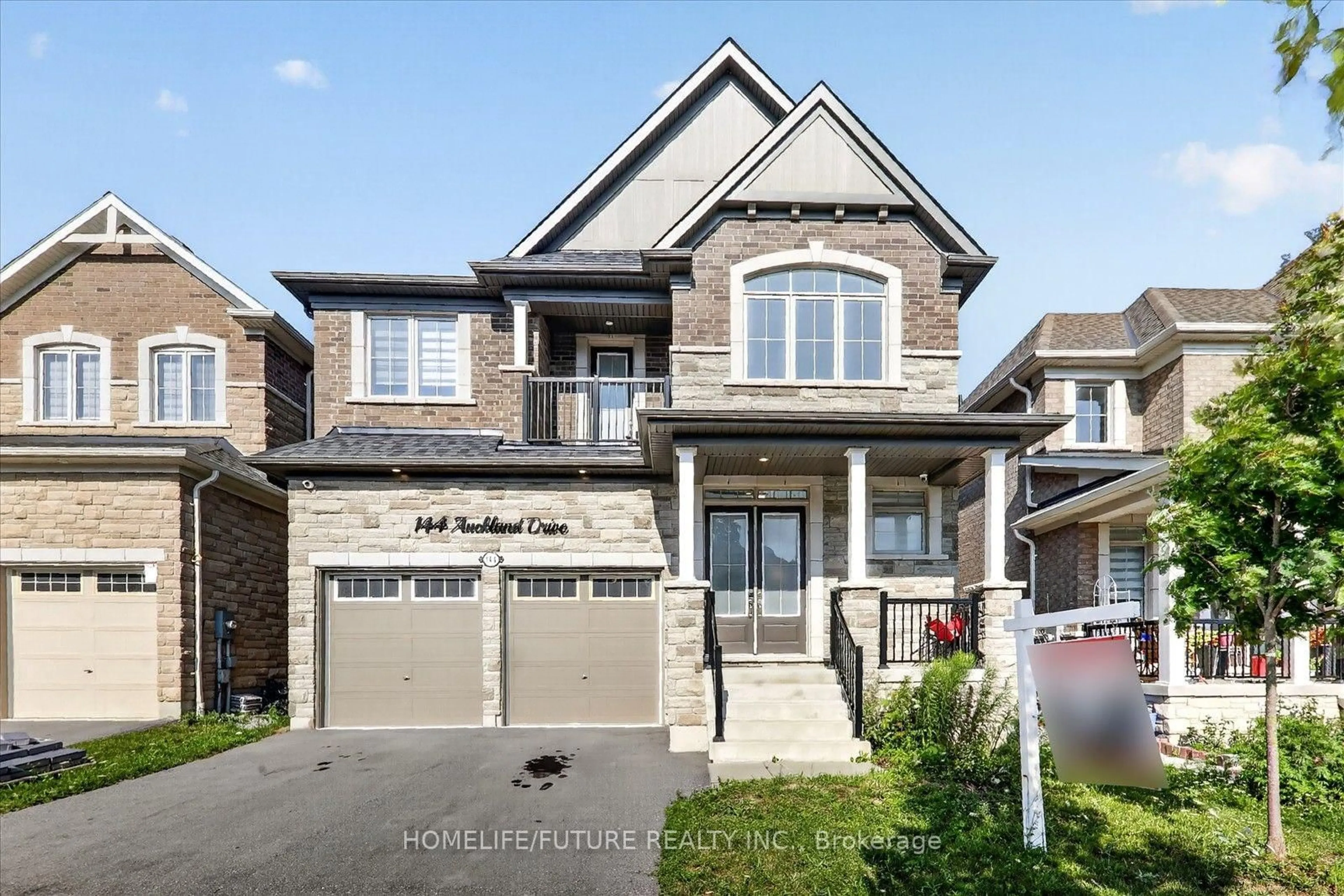 Home with brick exterior material, street for 144 Auckland Dr, Whitby Ontario L1P 0J2