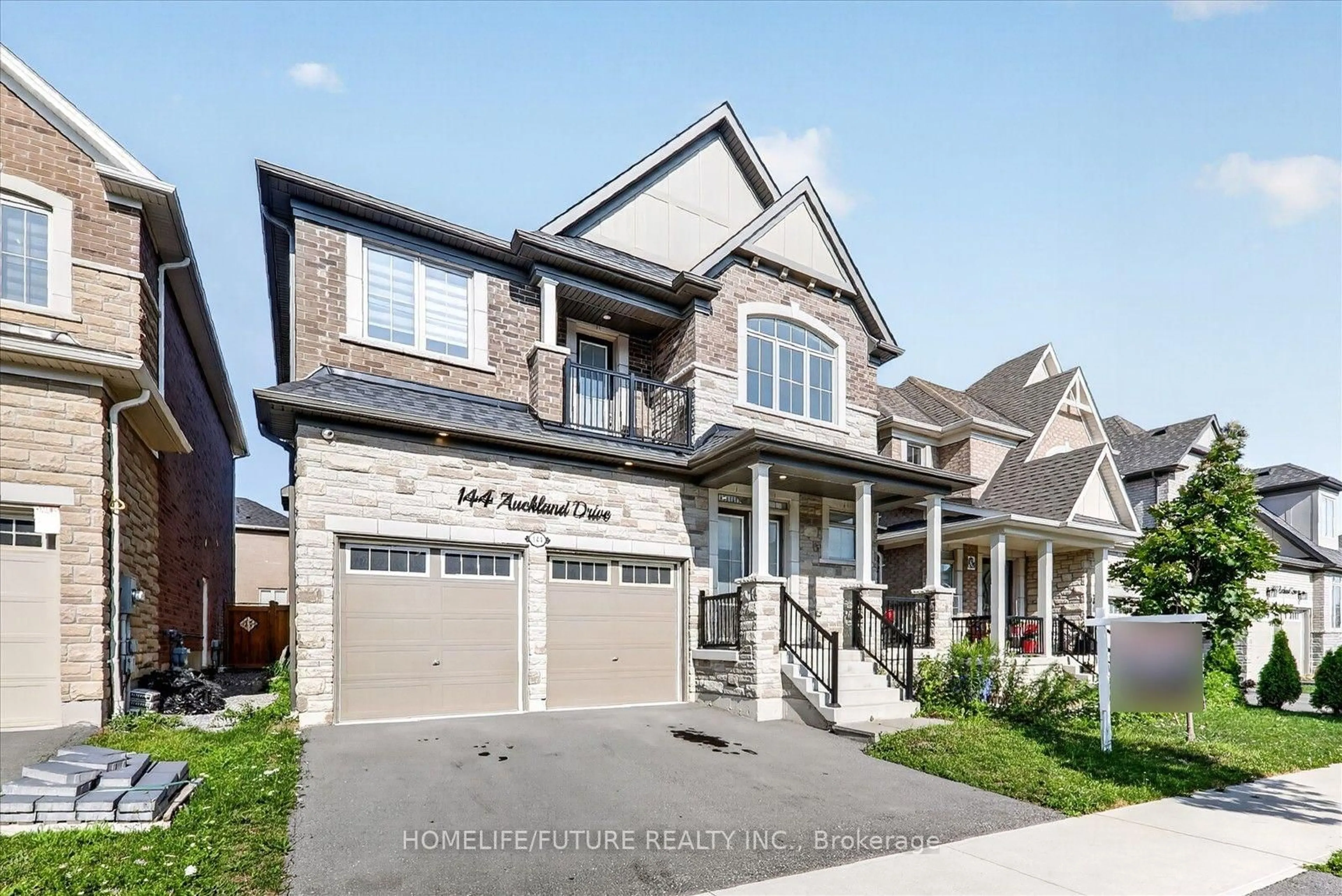 Home with brick exterior material, street for 144 Auckland Dr, Whitby Ontario L1P 0J2