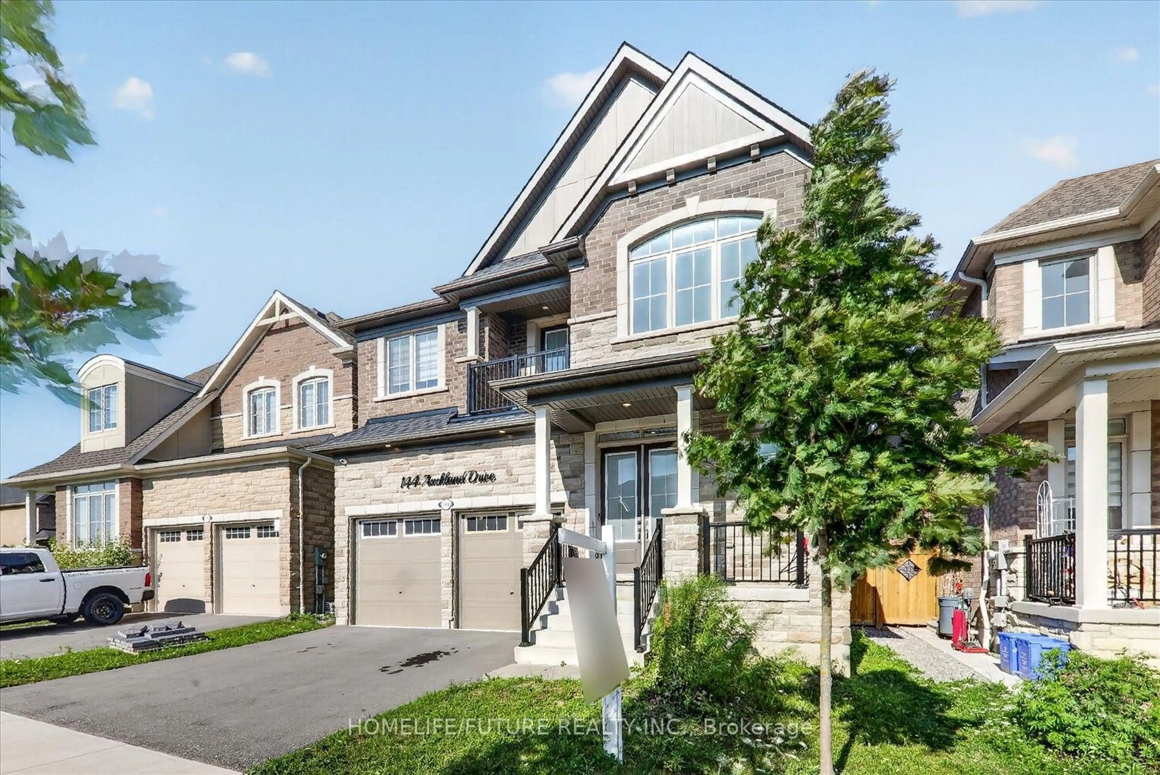 Home with brick exterior material, street for 144 Auckland Dr, Whitby Ontario L1P 0J2