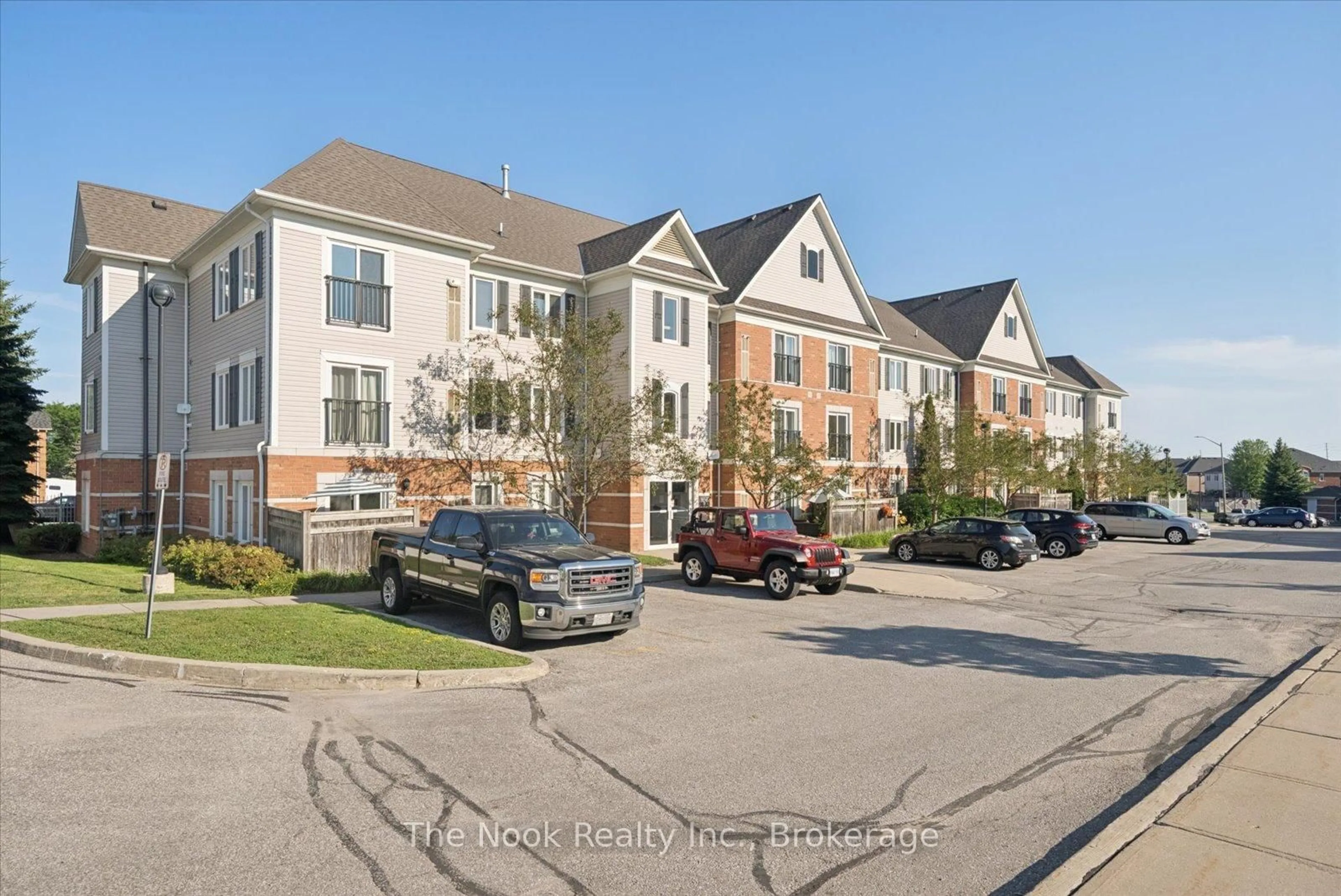 A pic from outside/outdoor area/front of a property/back of a property/a pic from drone, street for 106 Aspen Springs Dr #301, Clarington Ontario L1C 5N6