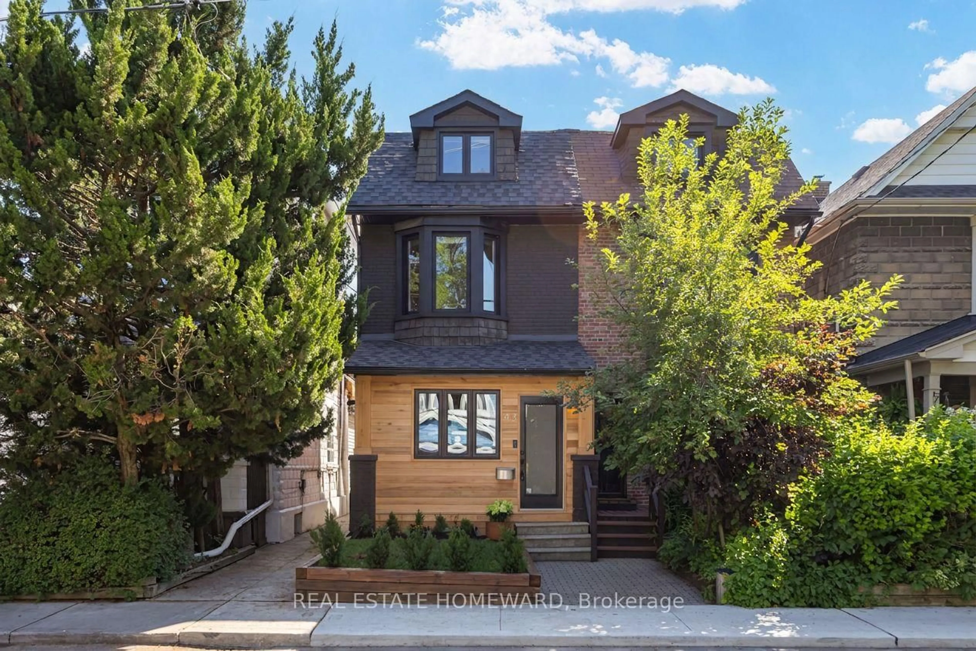 Home with brick exterior material, street for 43 Amroth Ave, Toronto Ontario M4C 4H3