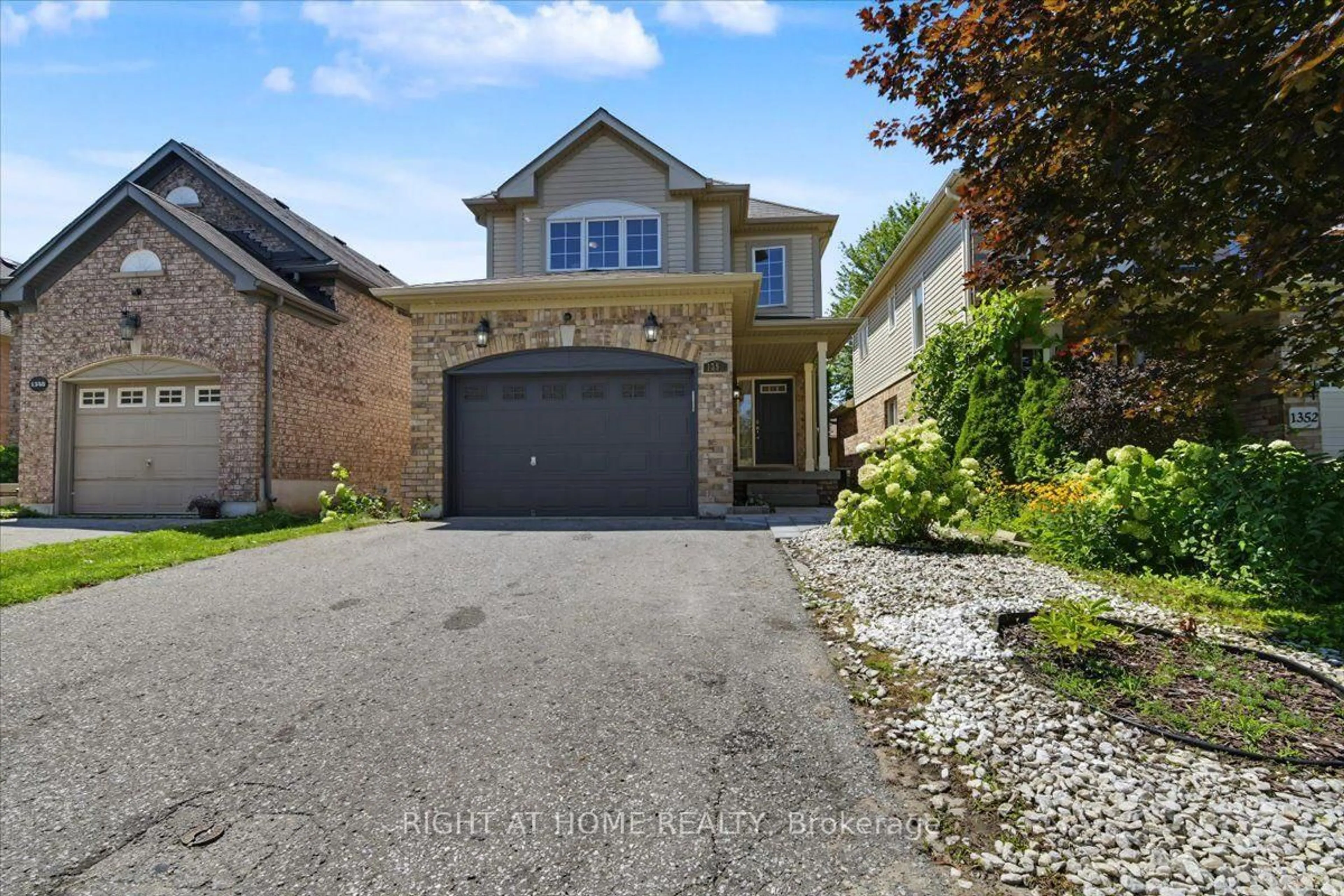 Home with brick exterior material, street for 1350 Wadebridge Cres, Oshawa Ontario L1K 3B2