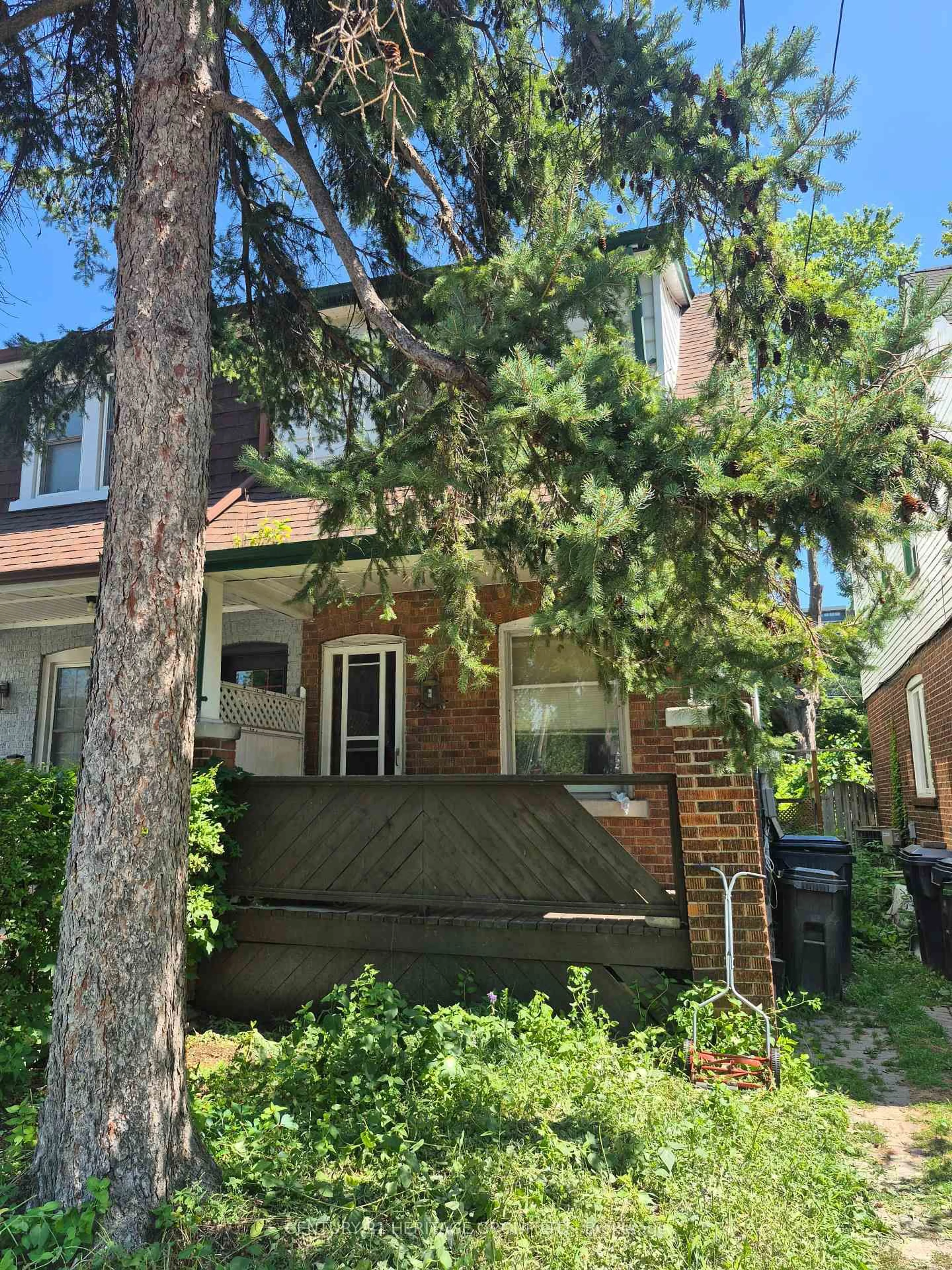 Home with brick exterior material, street for 235 Chisholm Ave, Toronto Ontario M4C 4V9