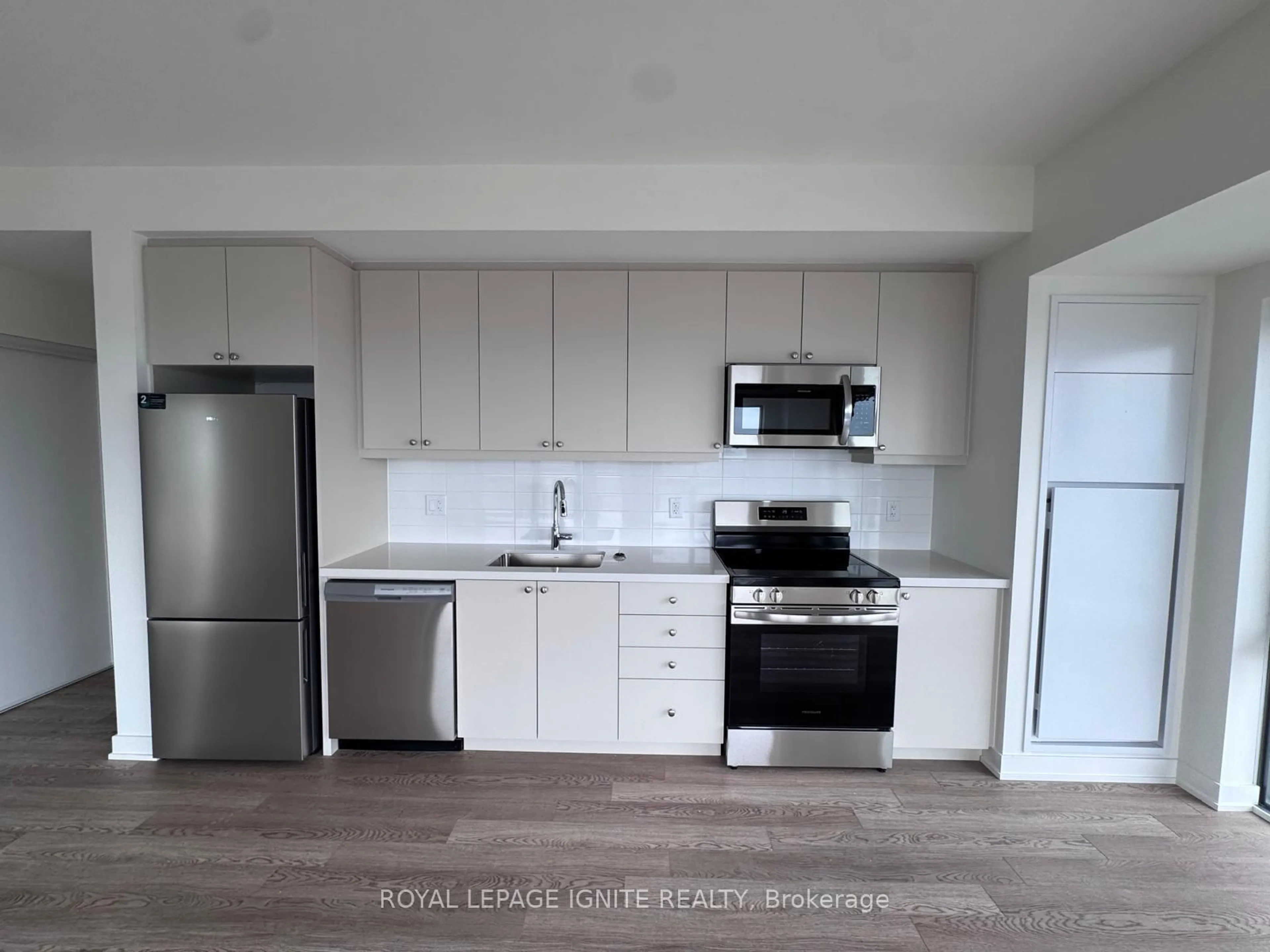 Standard kitchen, wood/laminate floor for 51 Clarington Blvd #1124, Clarington Ontario L1C 7J8