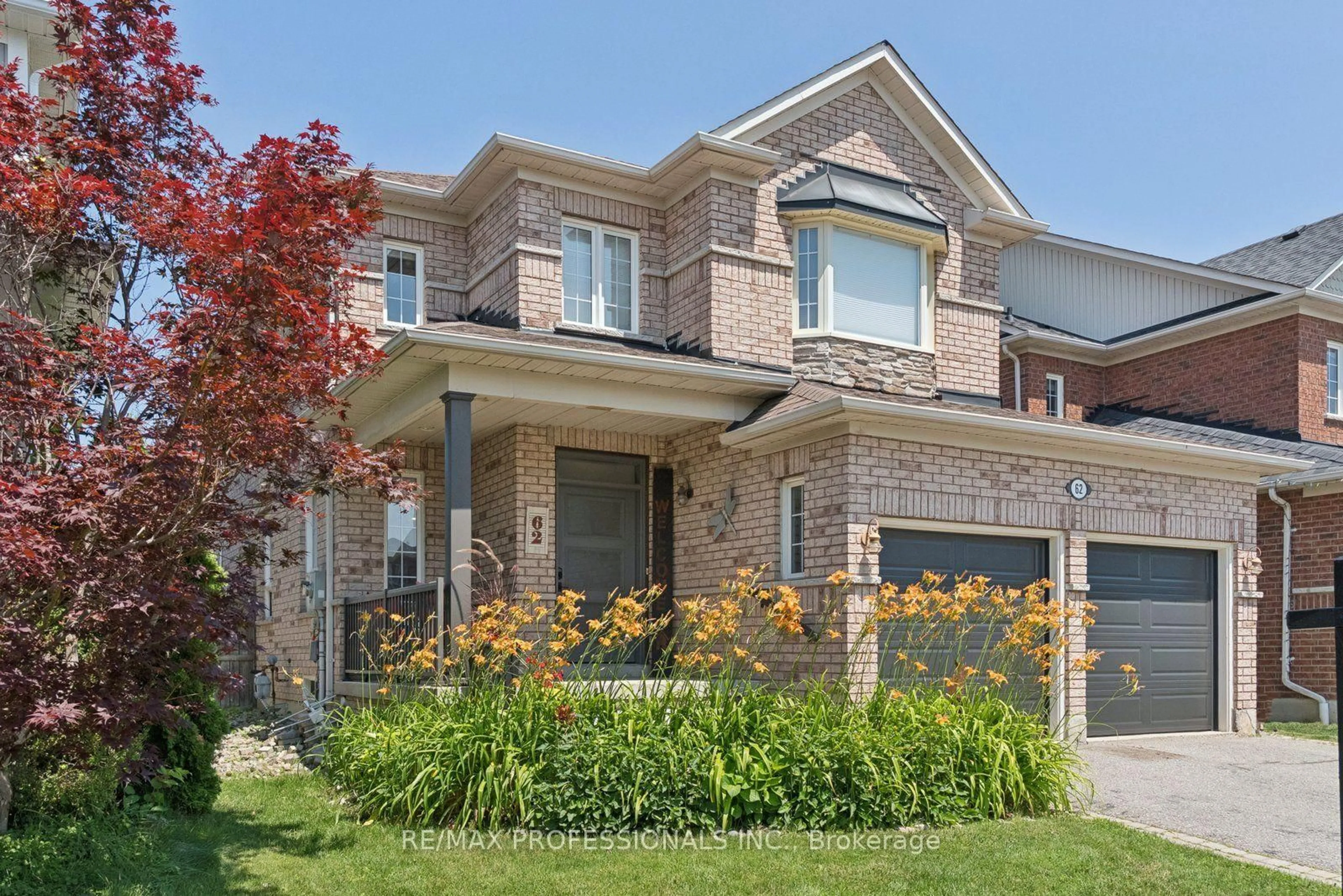 Home with brick exterior material, street for 62 Blackfriar Ave, Whitby Ontario L1M 2C1