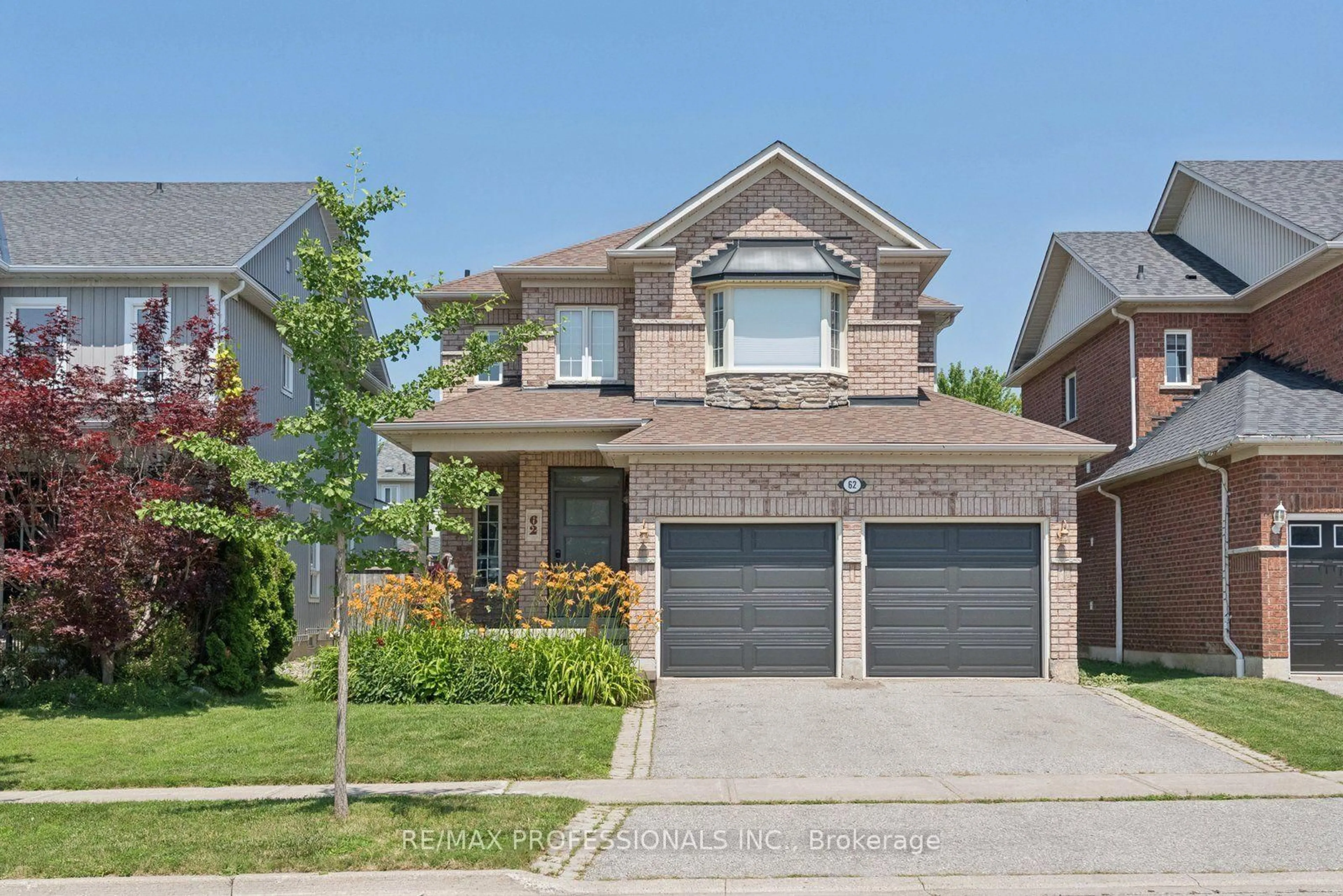 Home with brick exterior material, street for 62 Blackfriar Ave, Whitby Ontario L1M 2C1