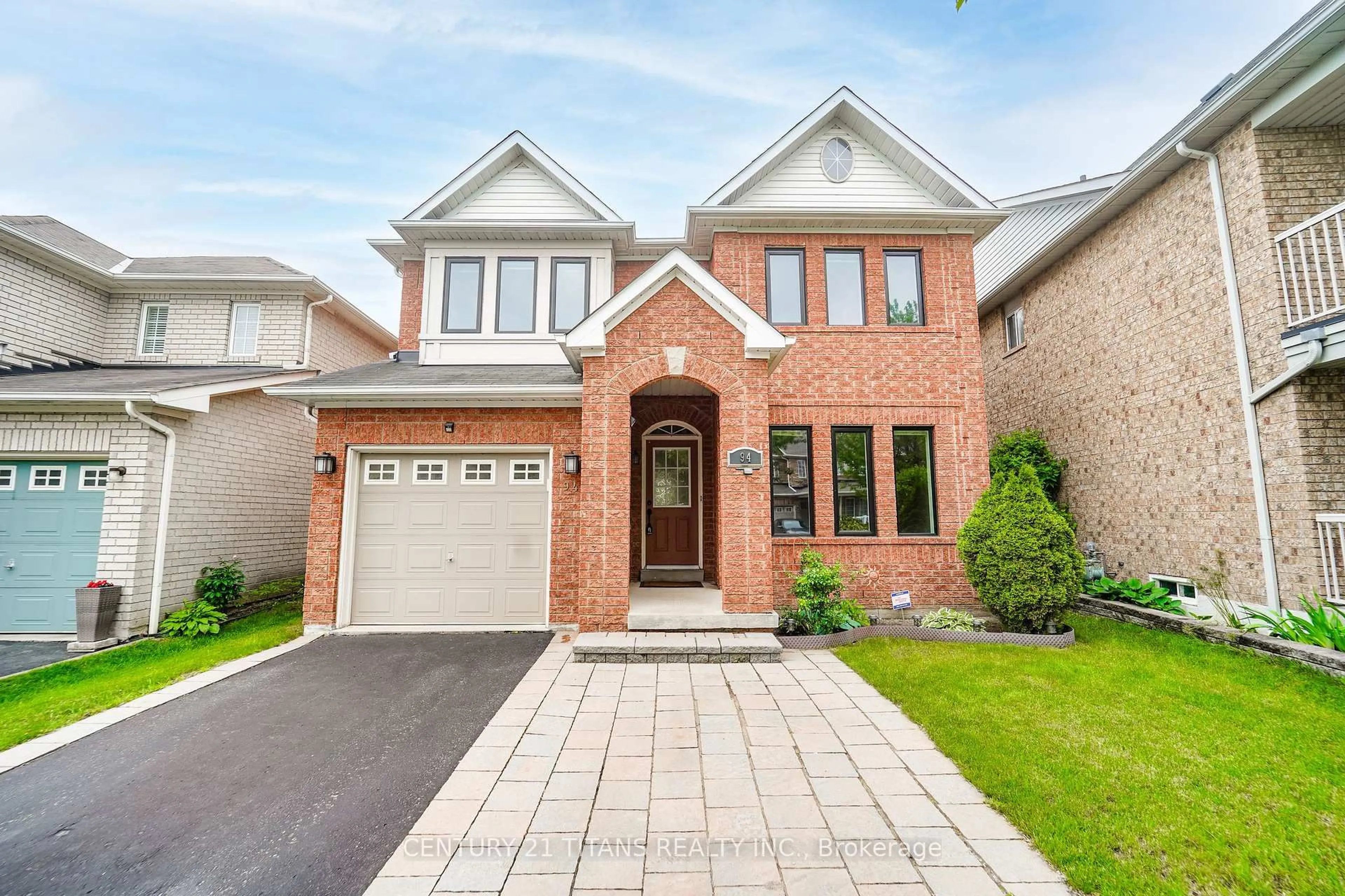Home with brick exterior material, street for 94 Greenhalf Dr, Ajax Ontario L1S 7R6