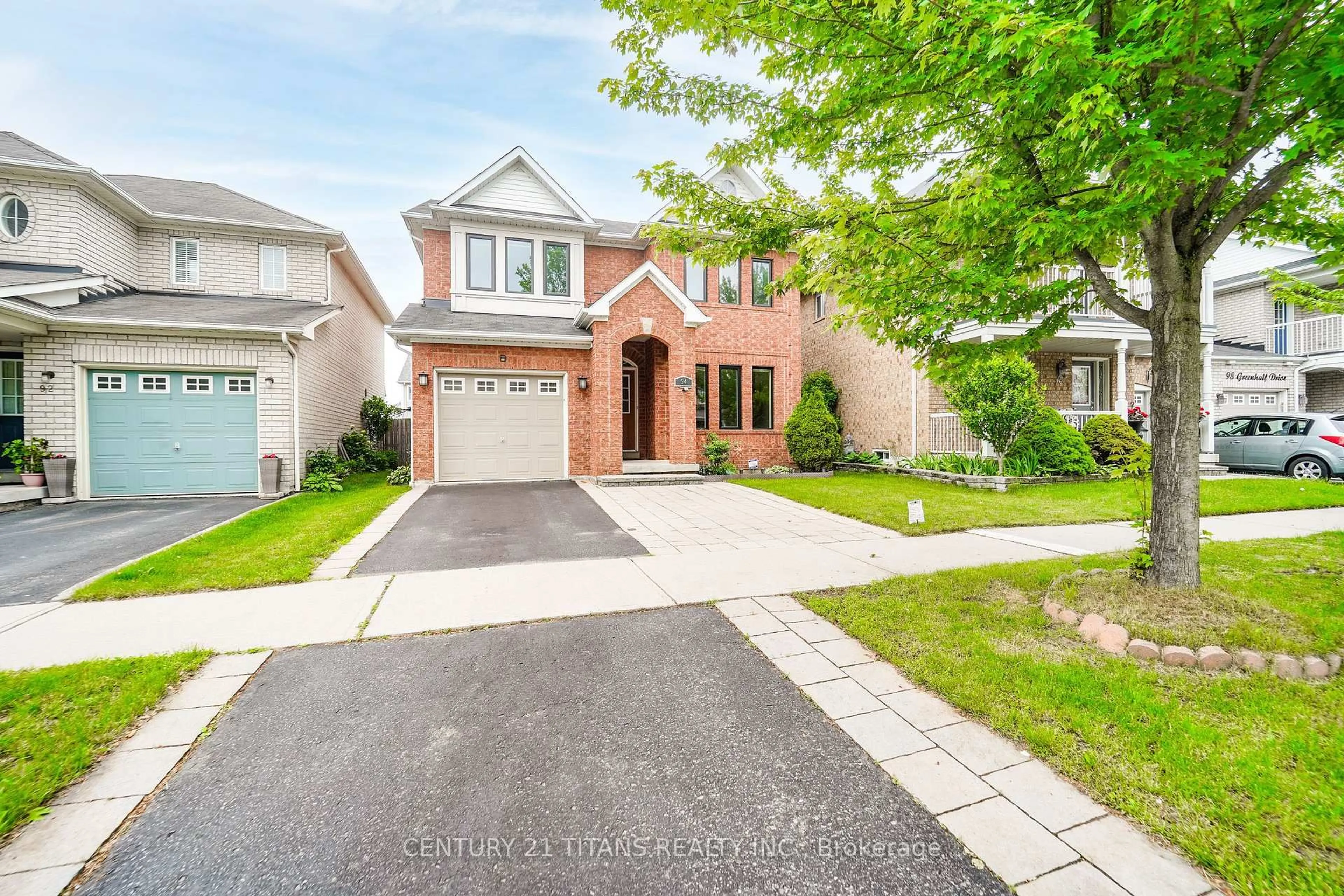 Home with brick exterior material, street for 94 Greenhalf Dr, Ajax Ontario L1S 7R6