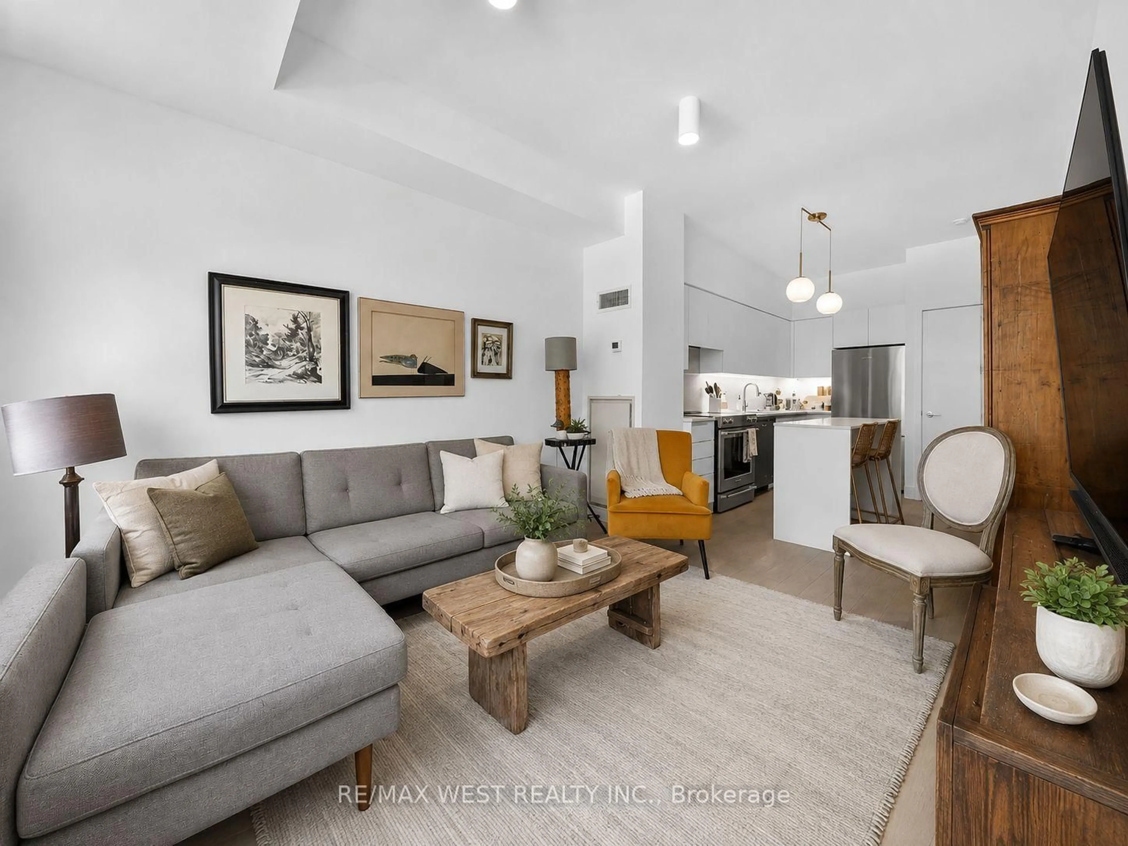 Living room with furniture, unknown for 601 Kingston Rd #215, Toronto Ontario M4E 1R3