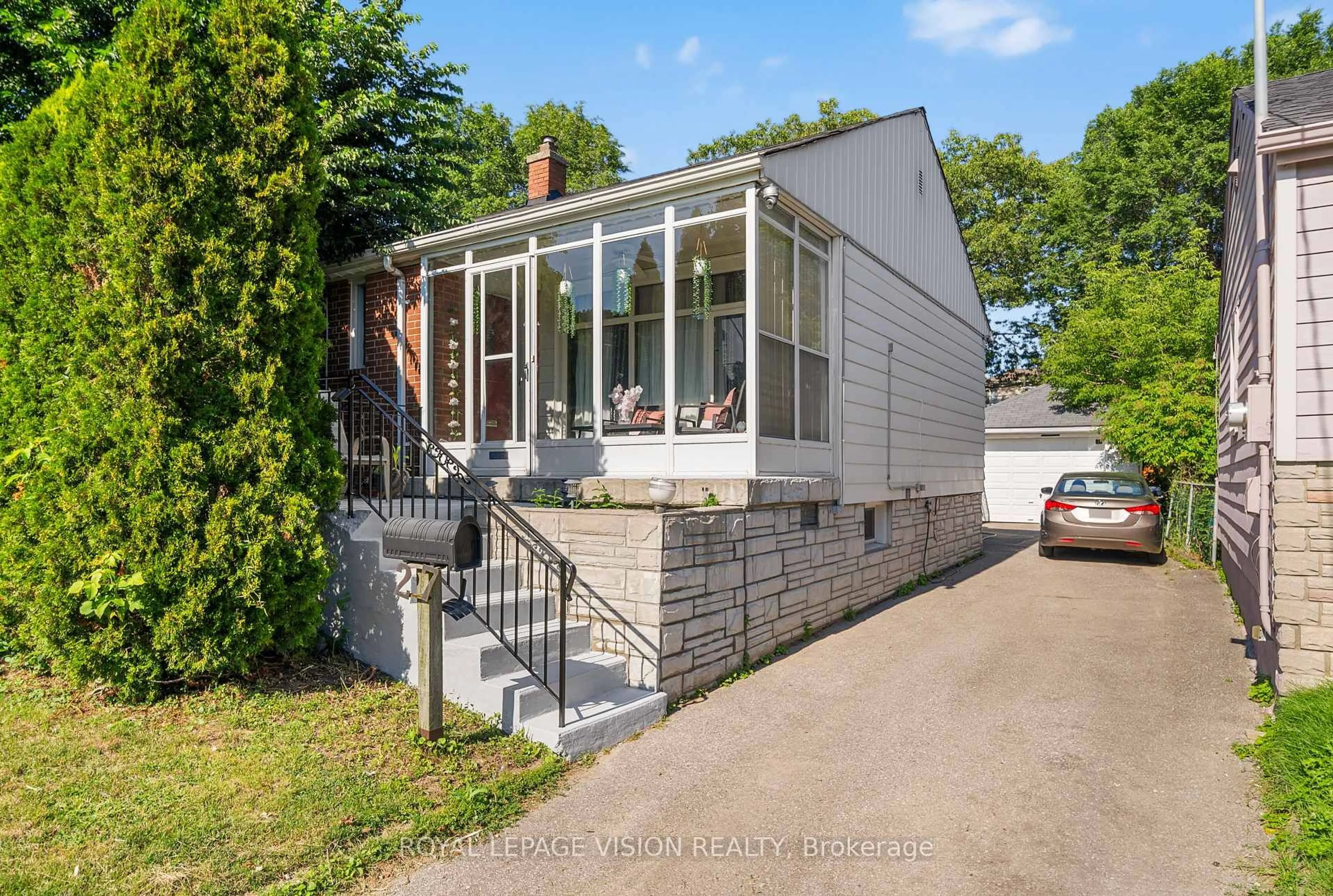 Home with brick exterior material, street for 27 Eastville Ave, Toronto Ontario M1M 2N6