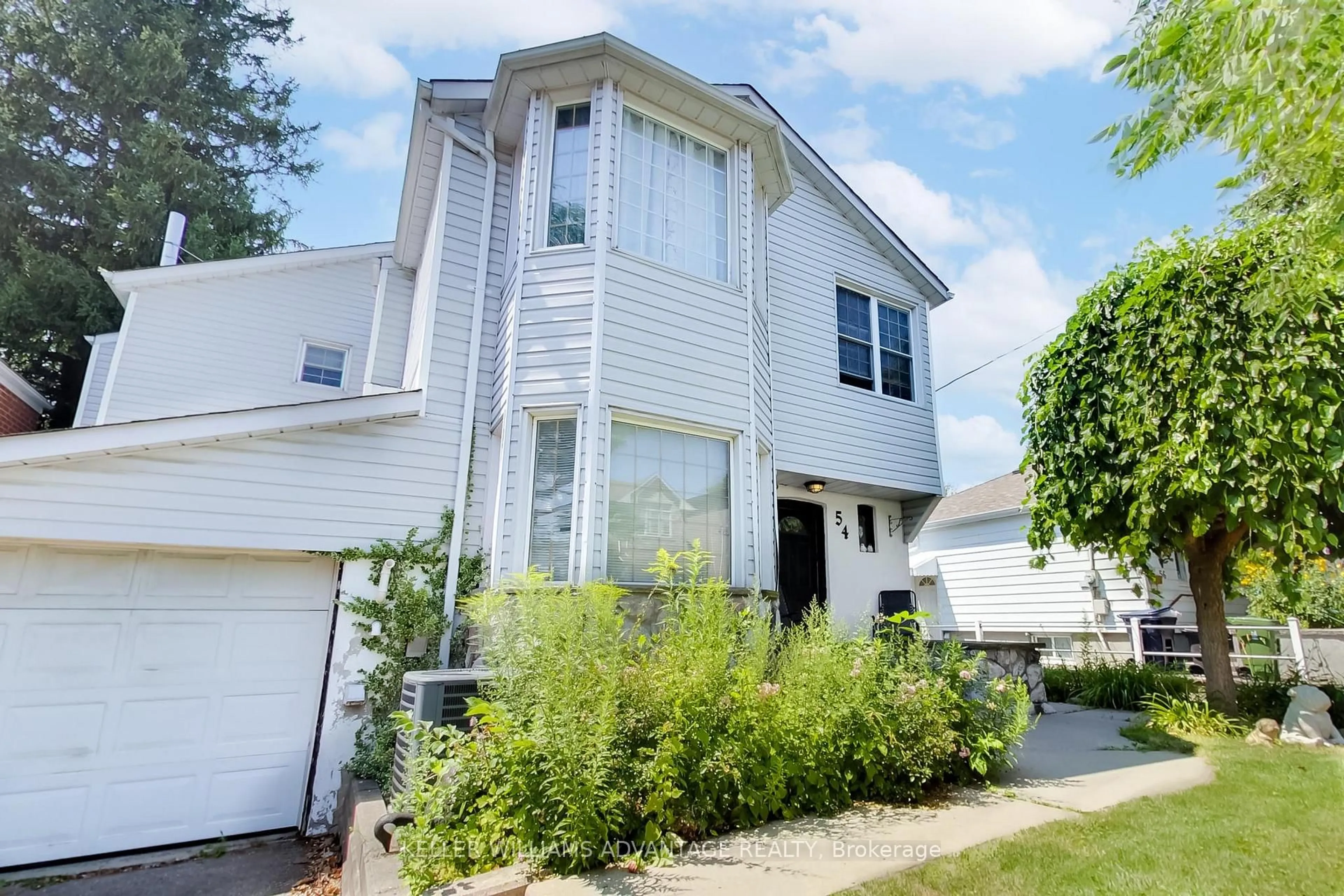 Home with vinyl exterior material, street for 54 Westbourne Ave, Toronto Ontario M1L 2Y4
