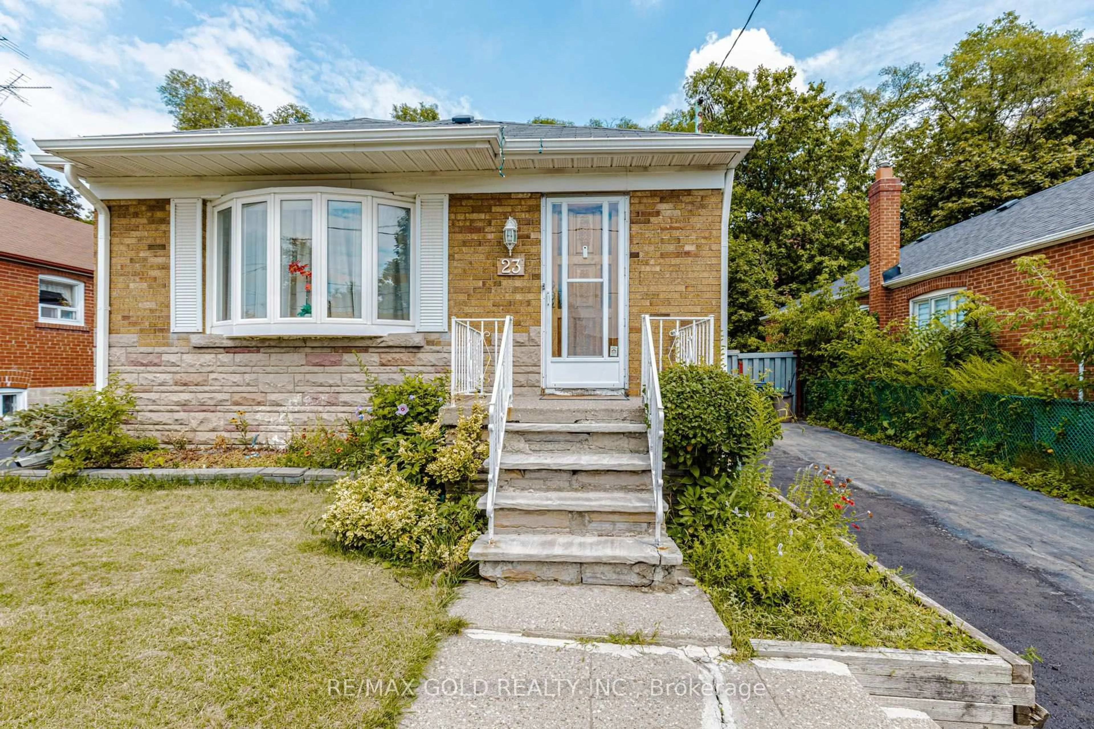 Home with brick exterior material, street for 23 Rensburg Dr, Toronto Ontario M1K 3A2