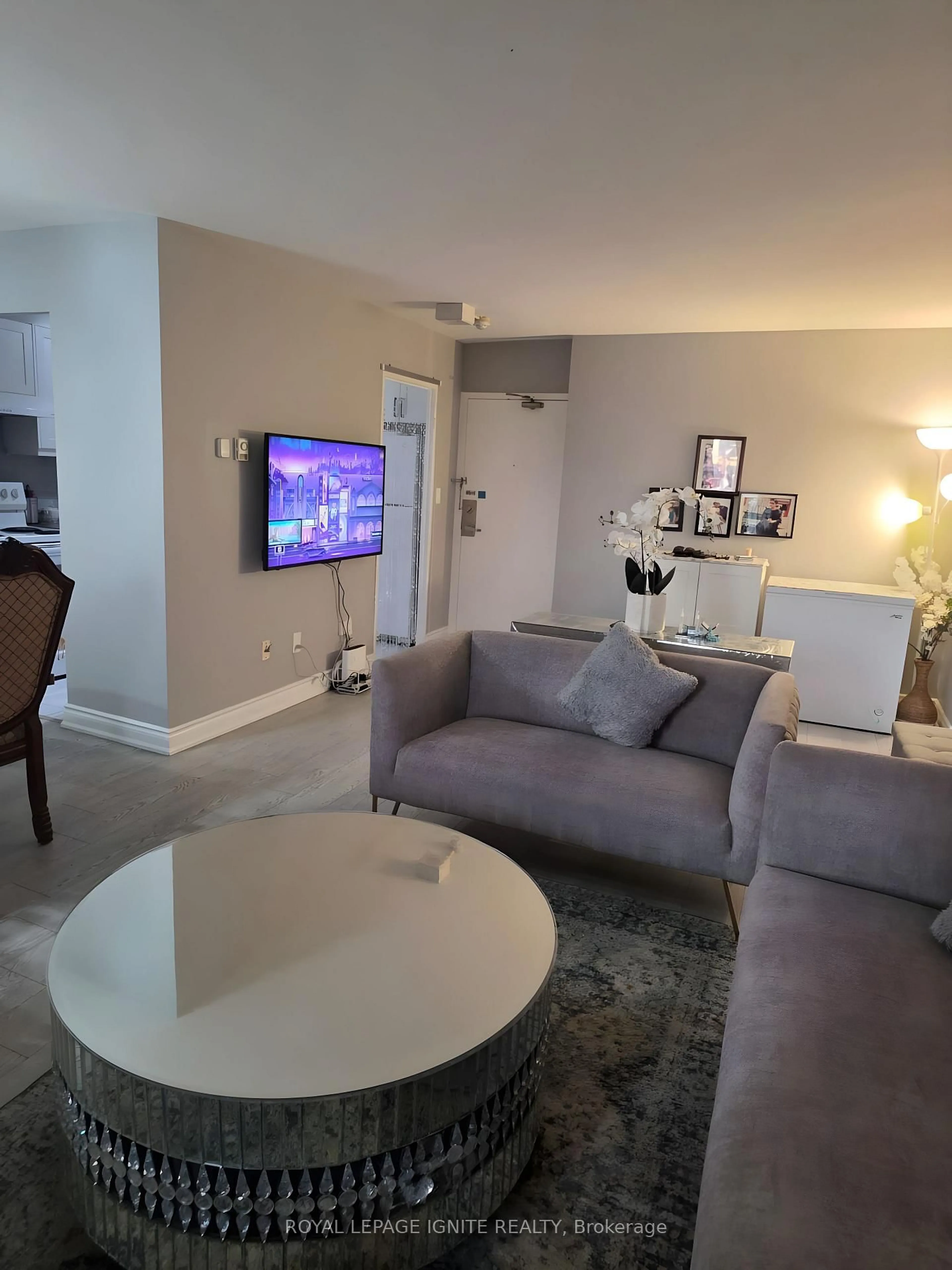 Living room with furniture, floor is not visible for 5 Massey Sq #415, Toronto Ontario M4C 5L6