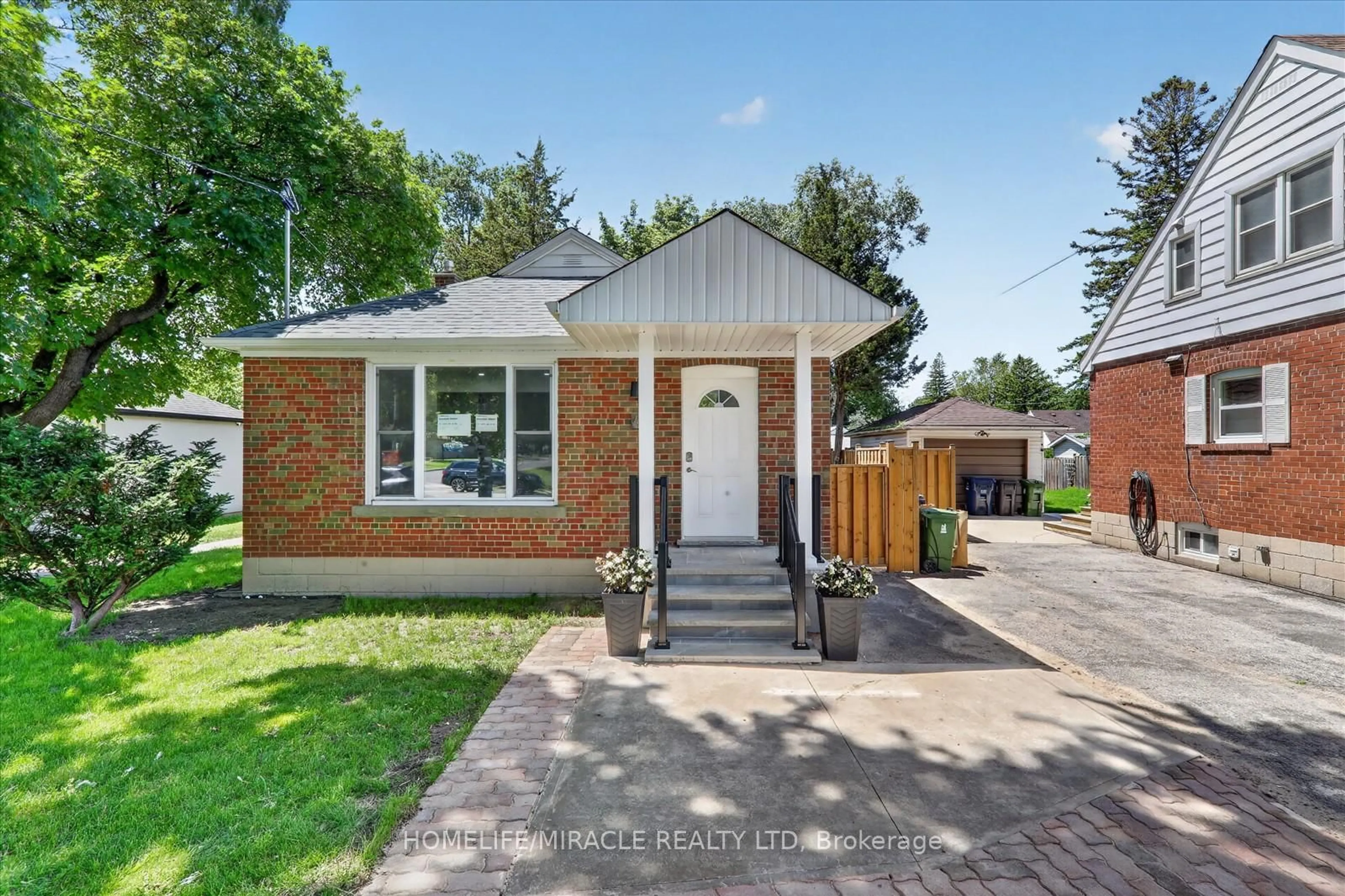 Home with brick exterior material, street for 46 Singleton Rd, Toronto Ontario M1R 1H9