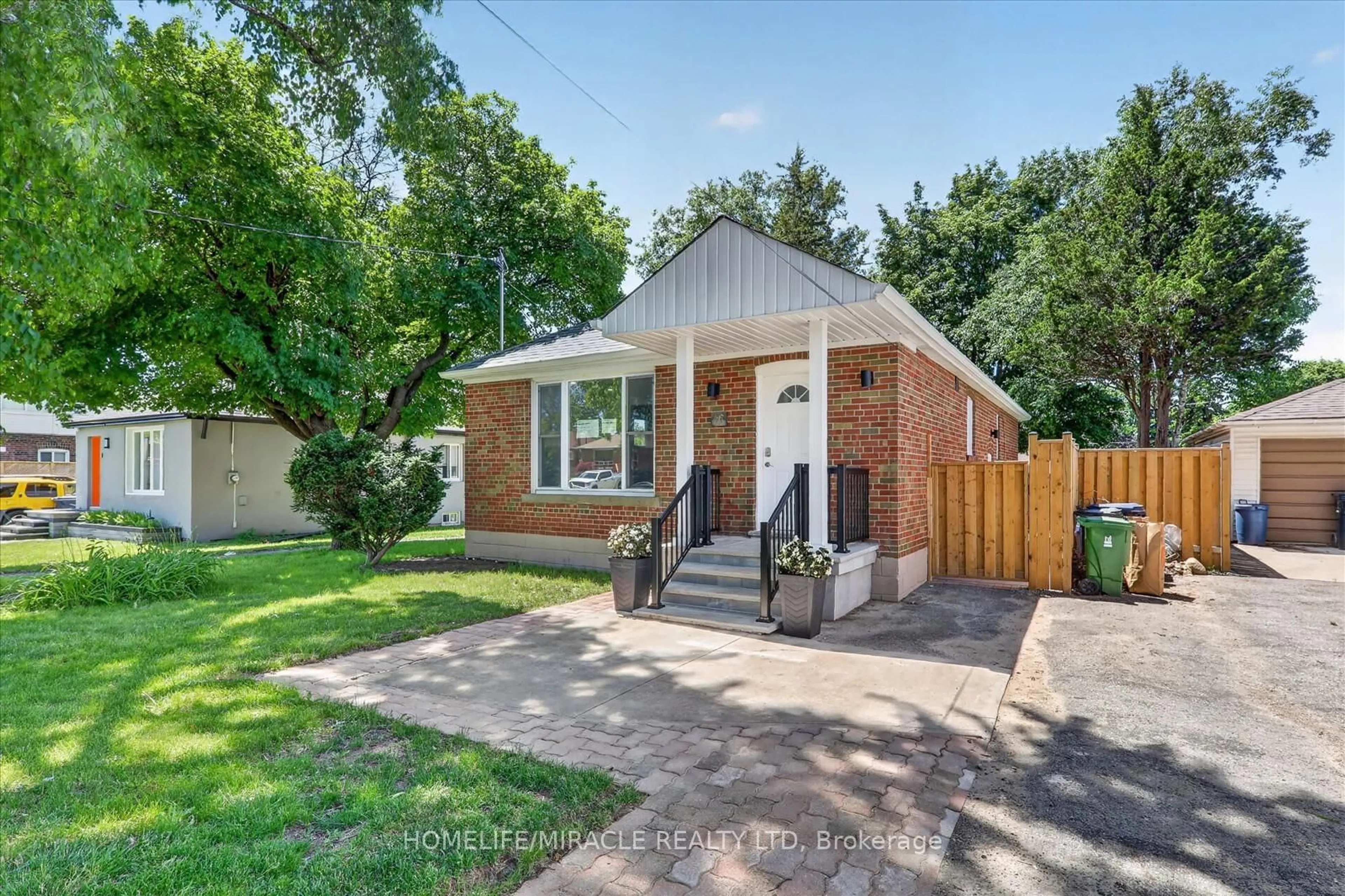 Home with brick exterior material, street for 46 Singleton Rd, Toronto Ontario M1R 1H9