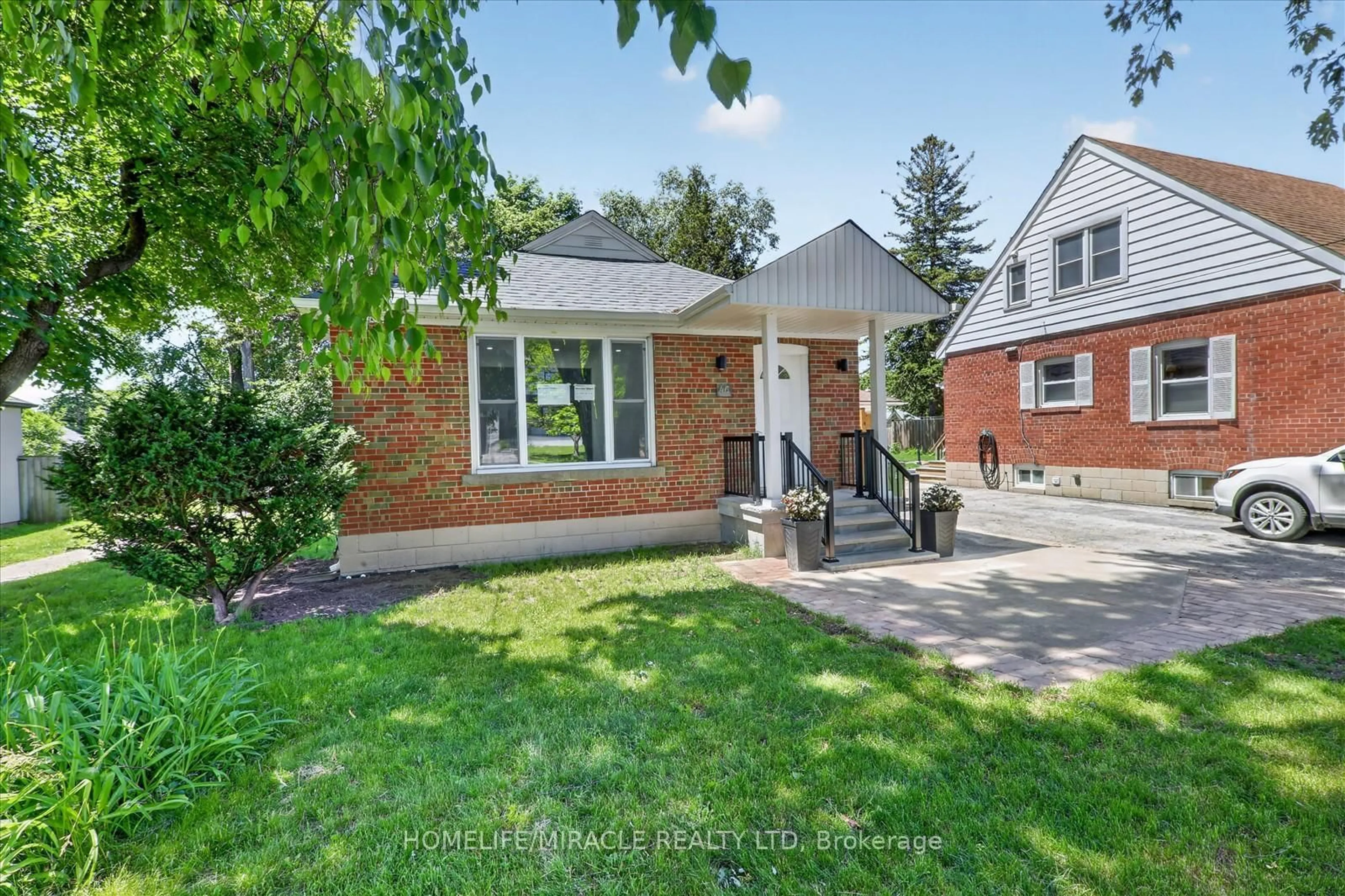 Home with brick exterior material, street for 46 Singleton Rd, Toronto Ontario M1R 1H9