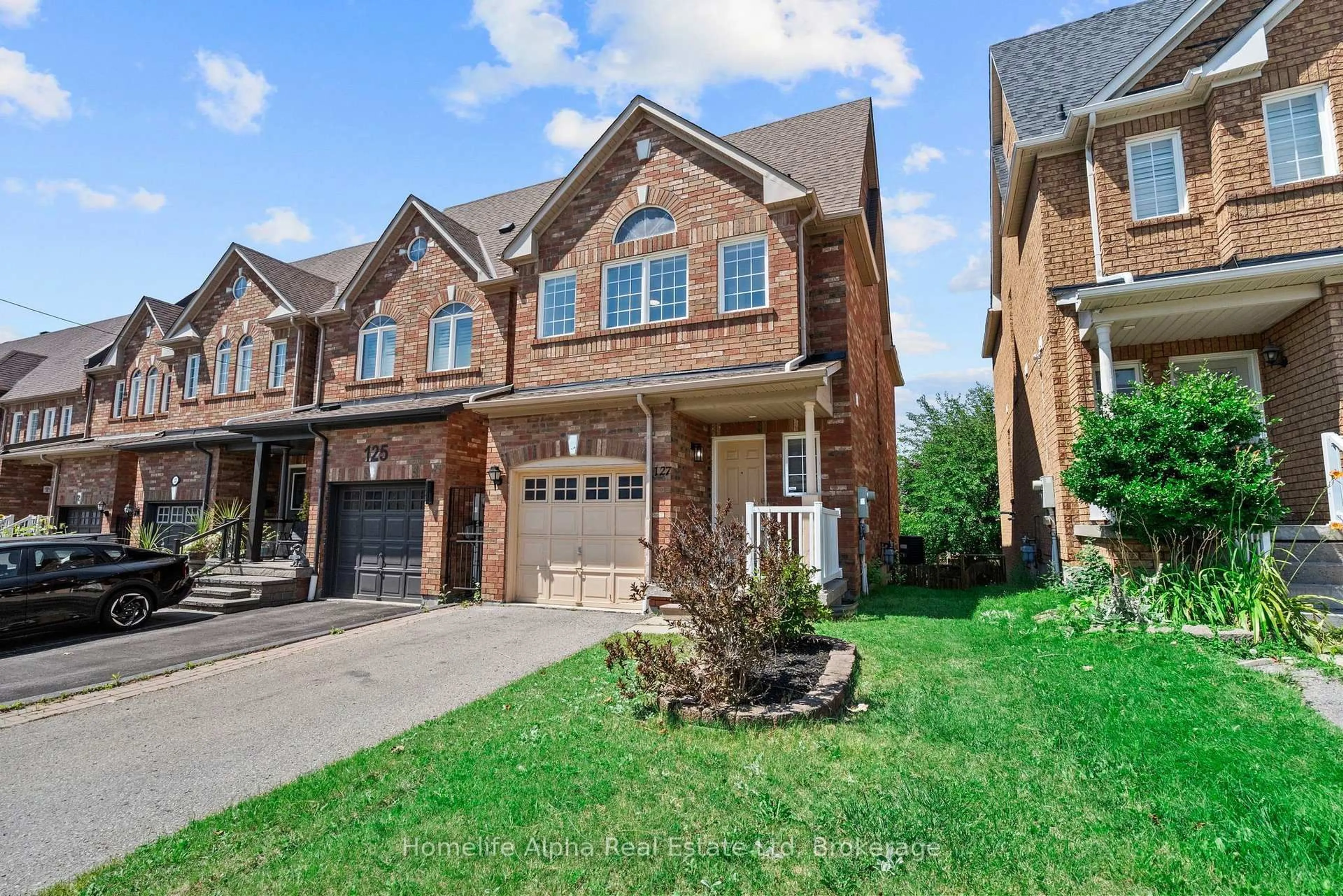 Home with brick exterior material, street for 127 Dooley Cres, Ajax Ontario L1T 4J3