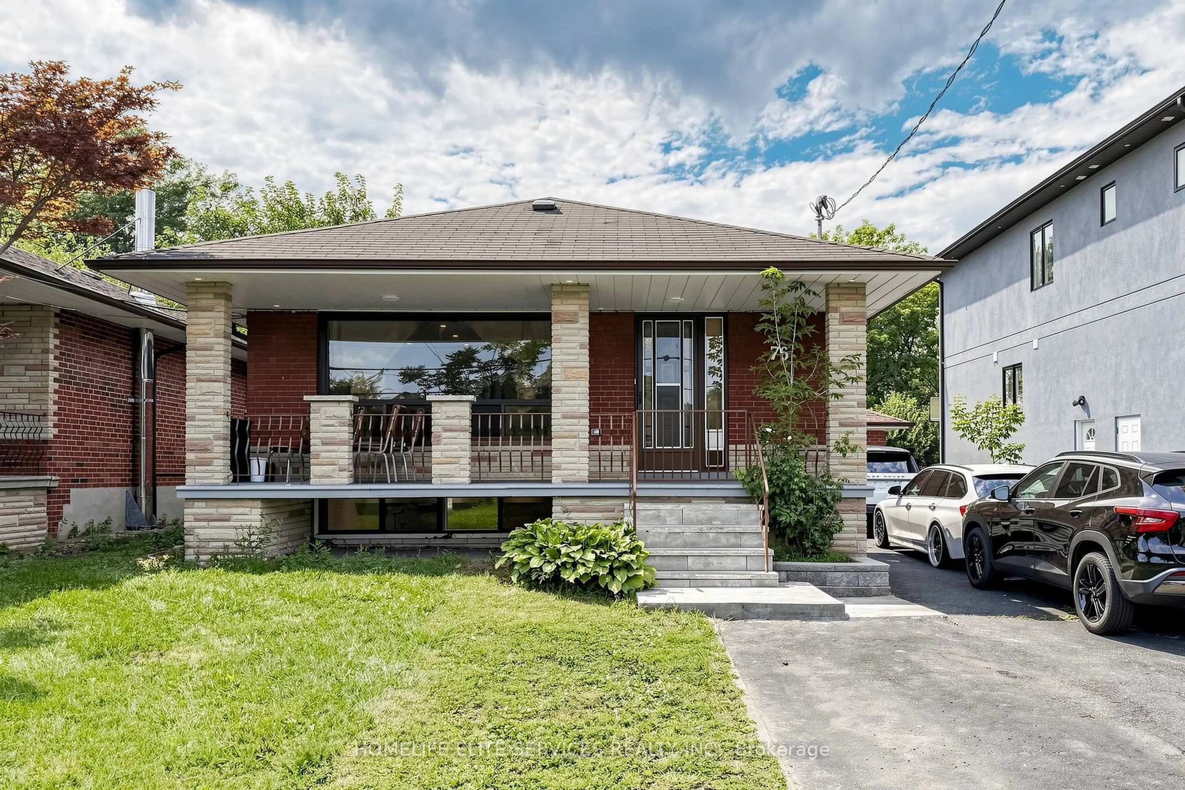 Home with brick exterior material, street for 76 Gooderham Dr, Toronto Ontario M1R 3G7