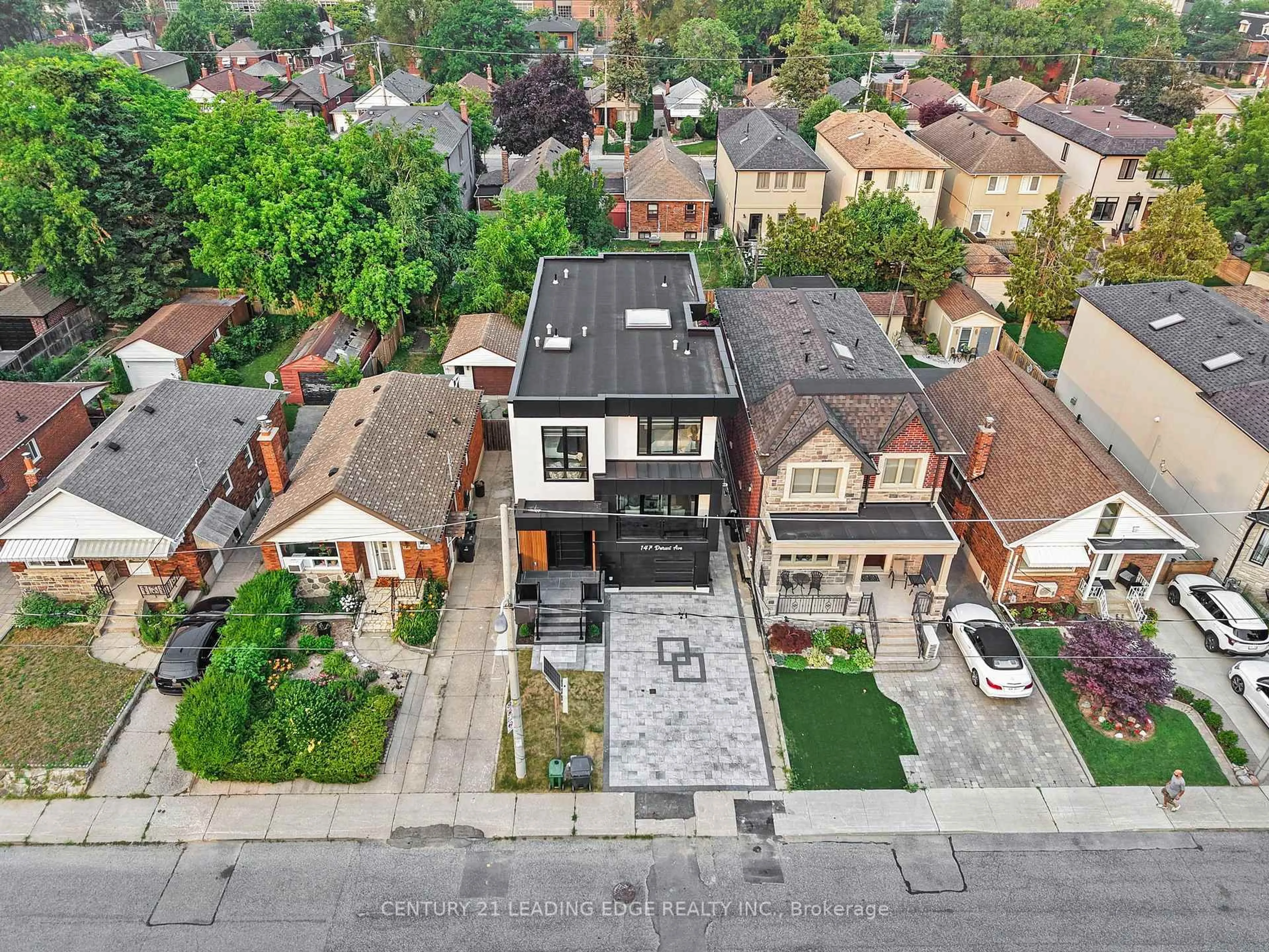 A pic from outside/outdoor area/front of a property/back of a property/a pic from drone, street for 147 Durant Ave, Toronto Ontario M4J 4W4