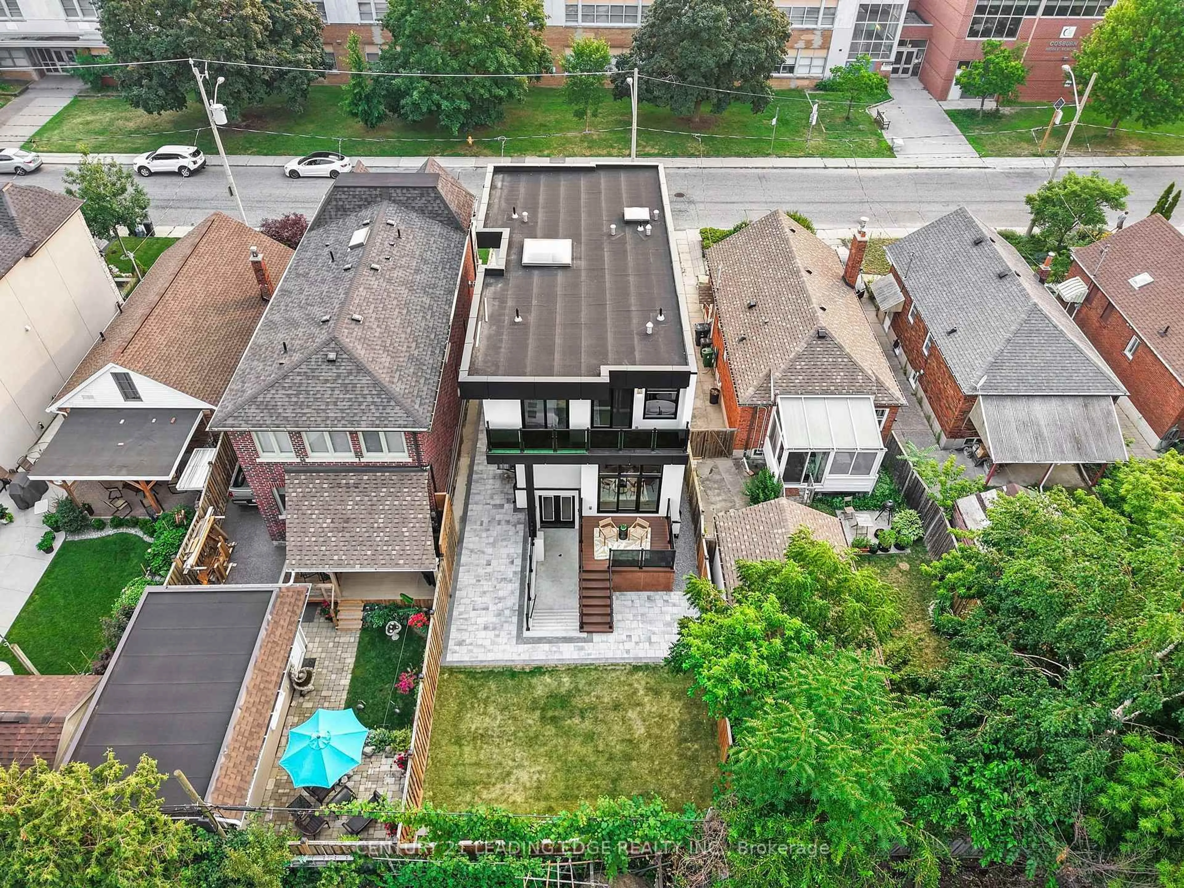 A pic from outside/outdoor area/front of a property/back of a property/a pic from drone, street for 147 Durant Ave, Toronto Ontario M4J 4W4