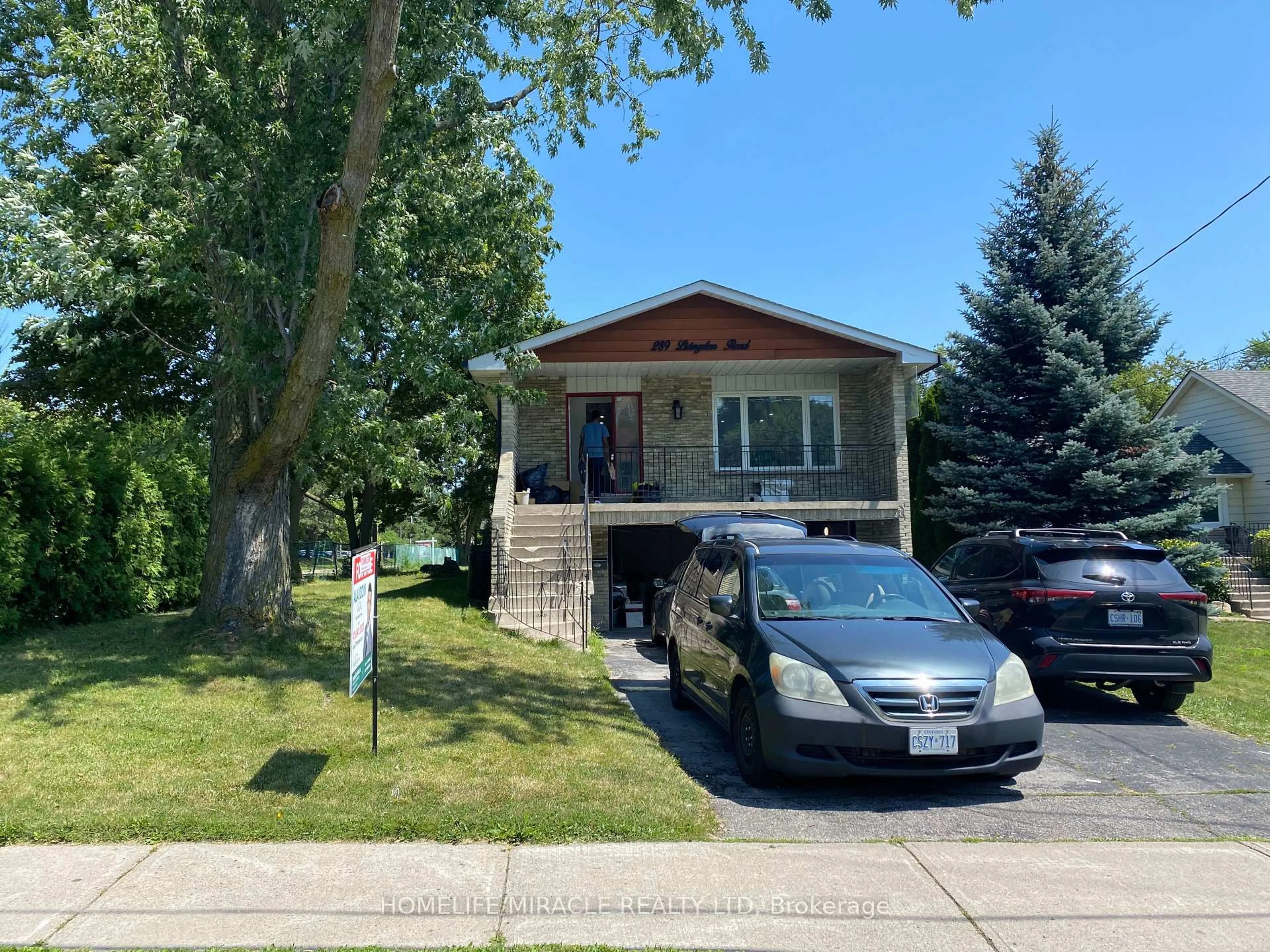 Home with vinyl exterior material, street for 289 Livingston Rd, Toronto Ontario M1E 1M2
