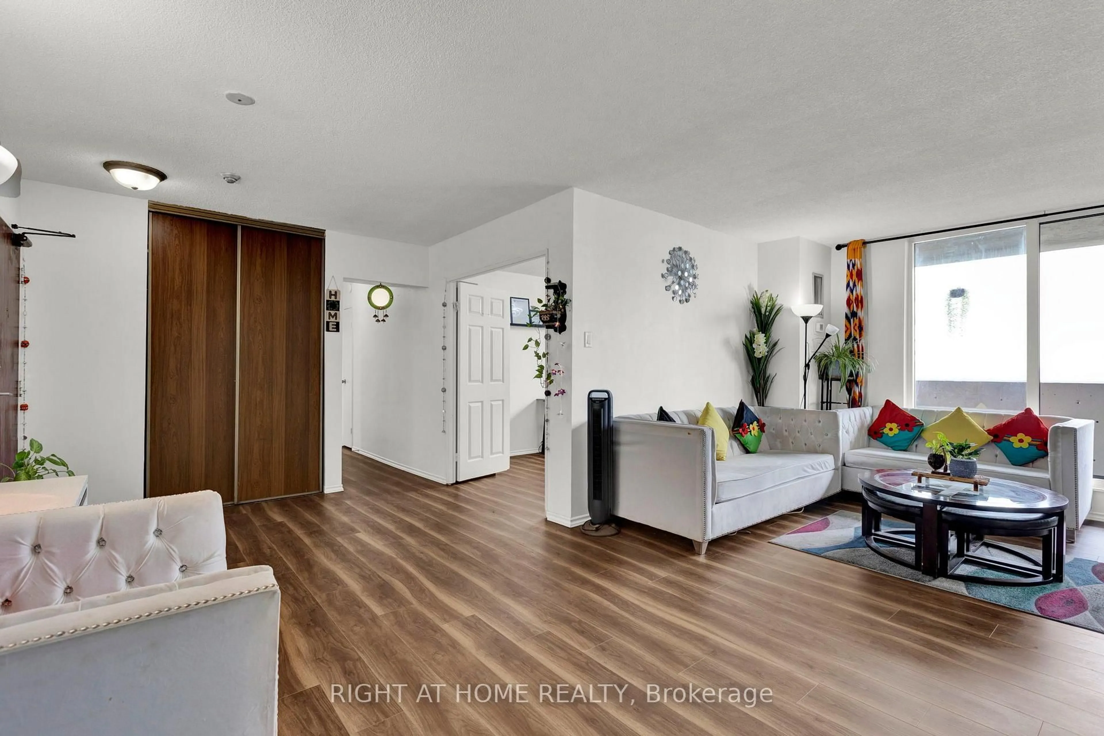 Living room with furniture, wood/laminate floor for 100 Prudential Dr #1608, Toronto Ontario M1P 4V4