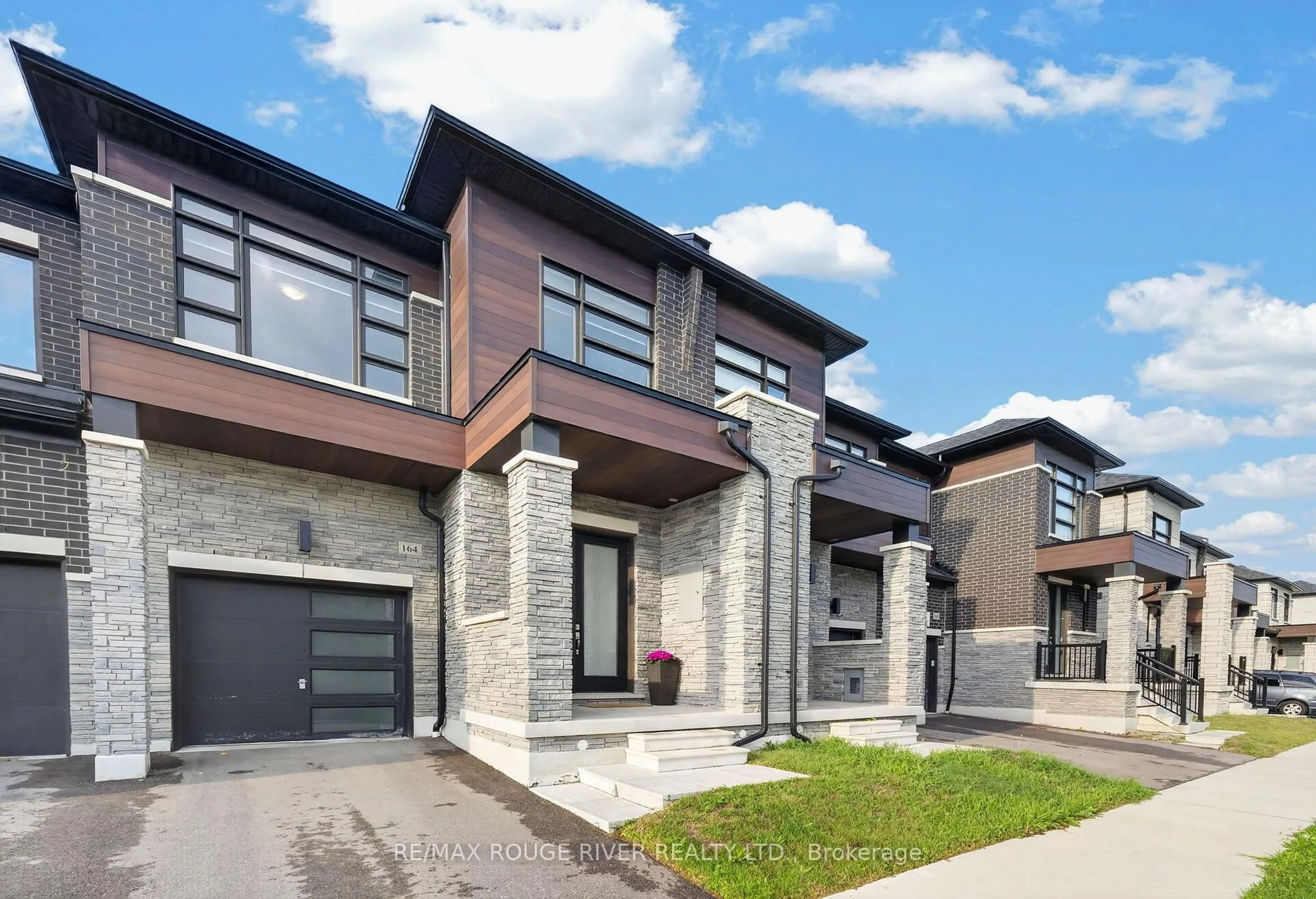 Home with brick exterior material, street for 164 Ogston Cres, Whitby Ontario L1P 0H3