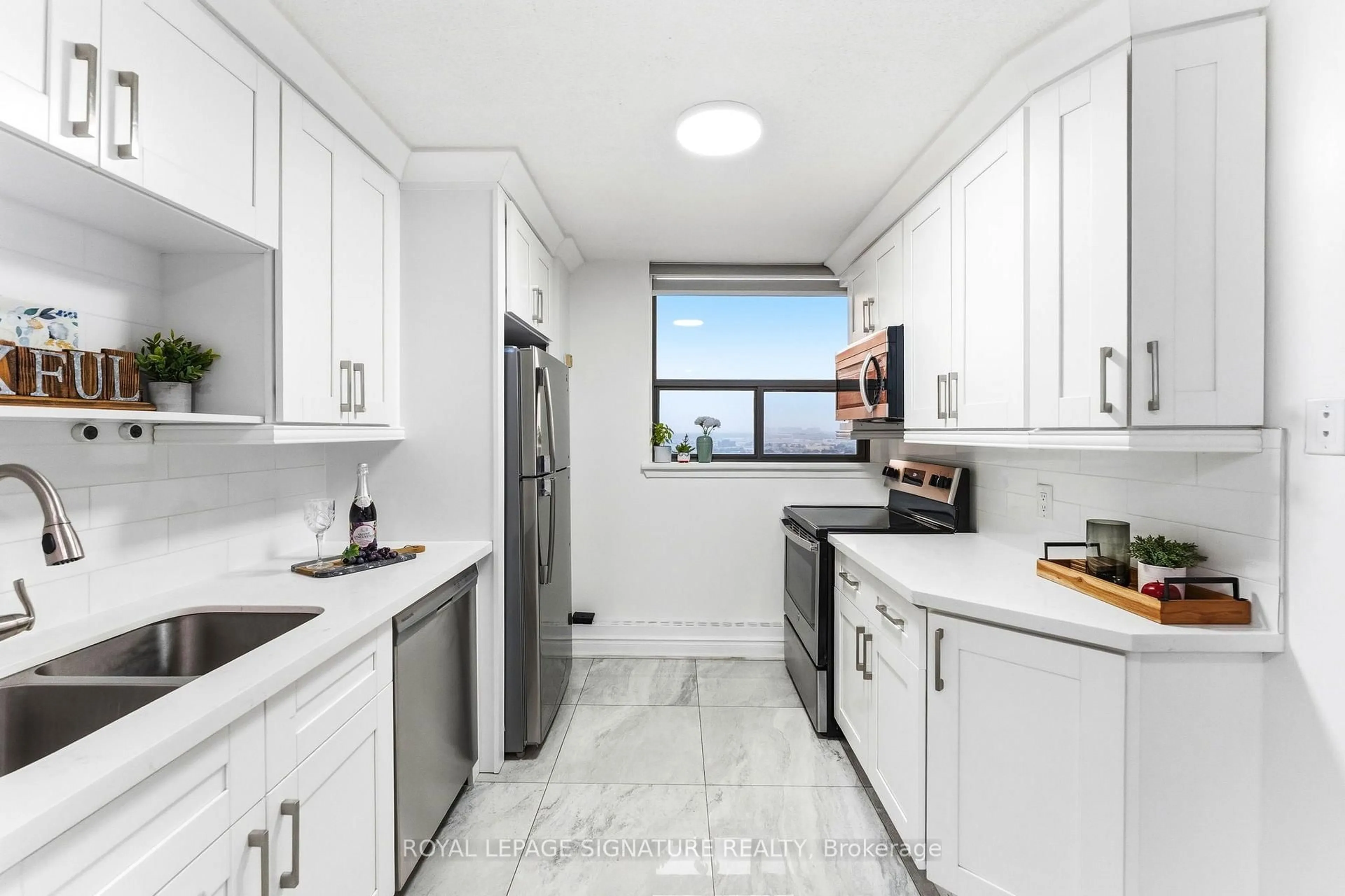 Standard kitchen, ceramic/tile floor for 100 Wingarden Crt #1807, Toronto Ontario M1B 2P4