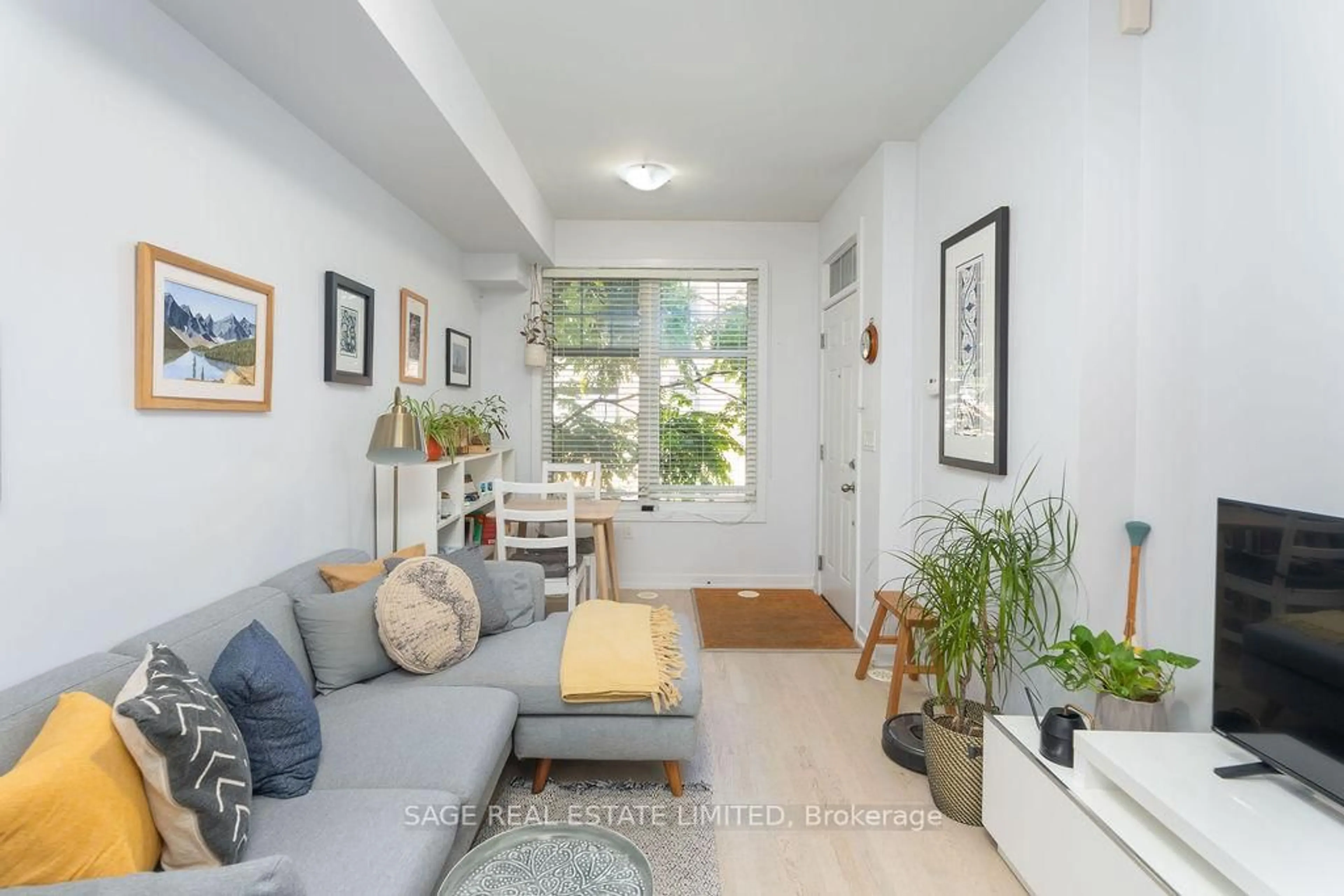 Living room with furniture, unknown for 150 Broadview Ave #Th3, Toronto Ontario M4M 0A9