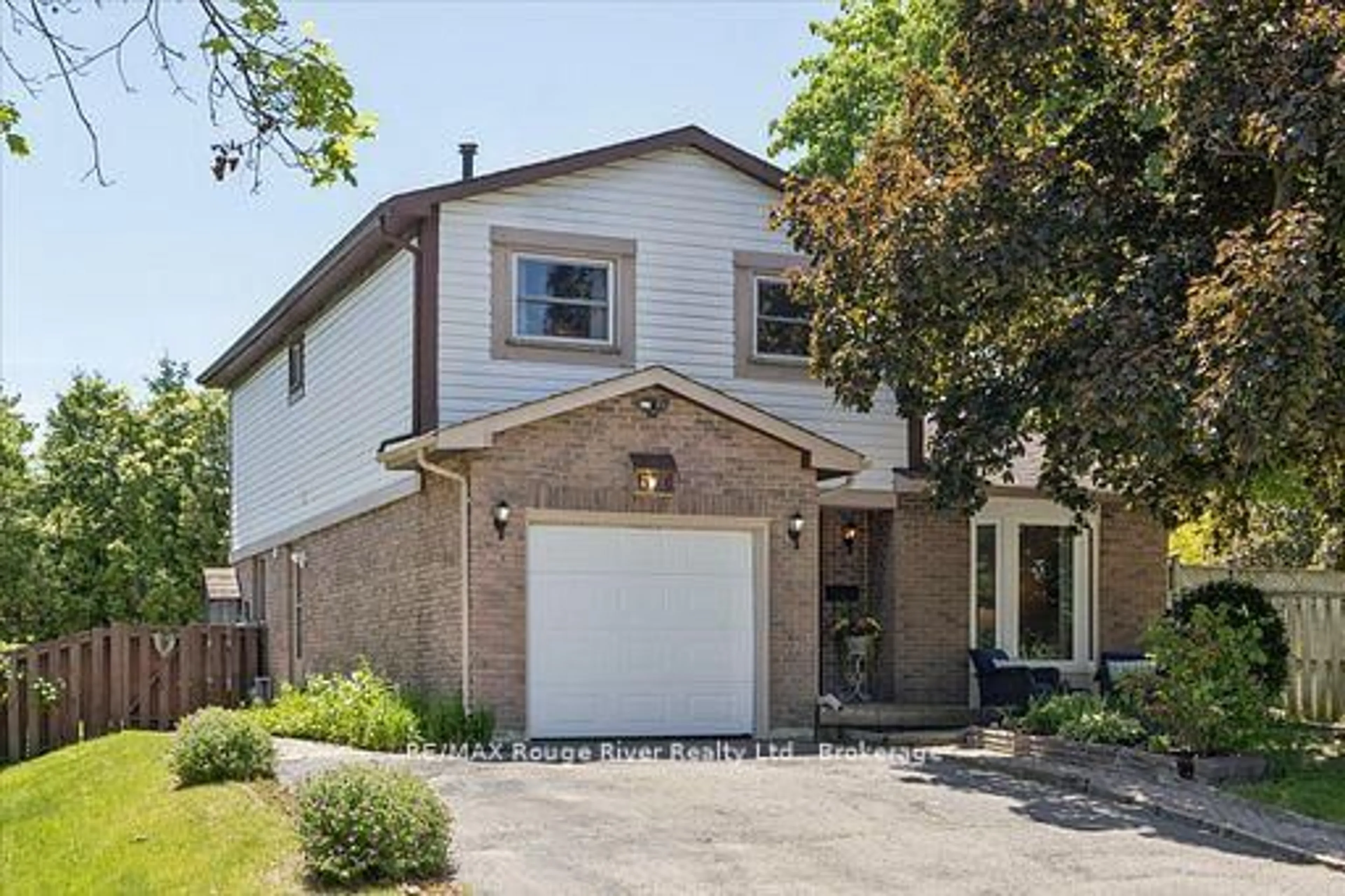 Home with brick exterior material, street for 671 Greenbriar Dr, Oshawa Ontario L1G 7J5