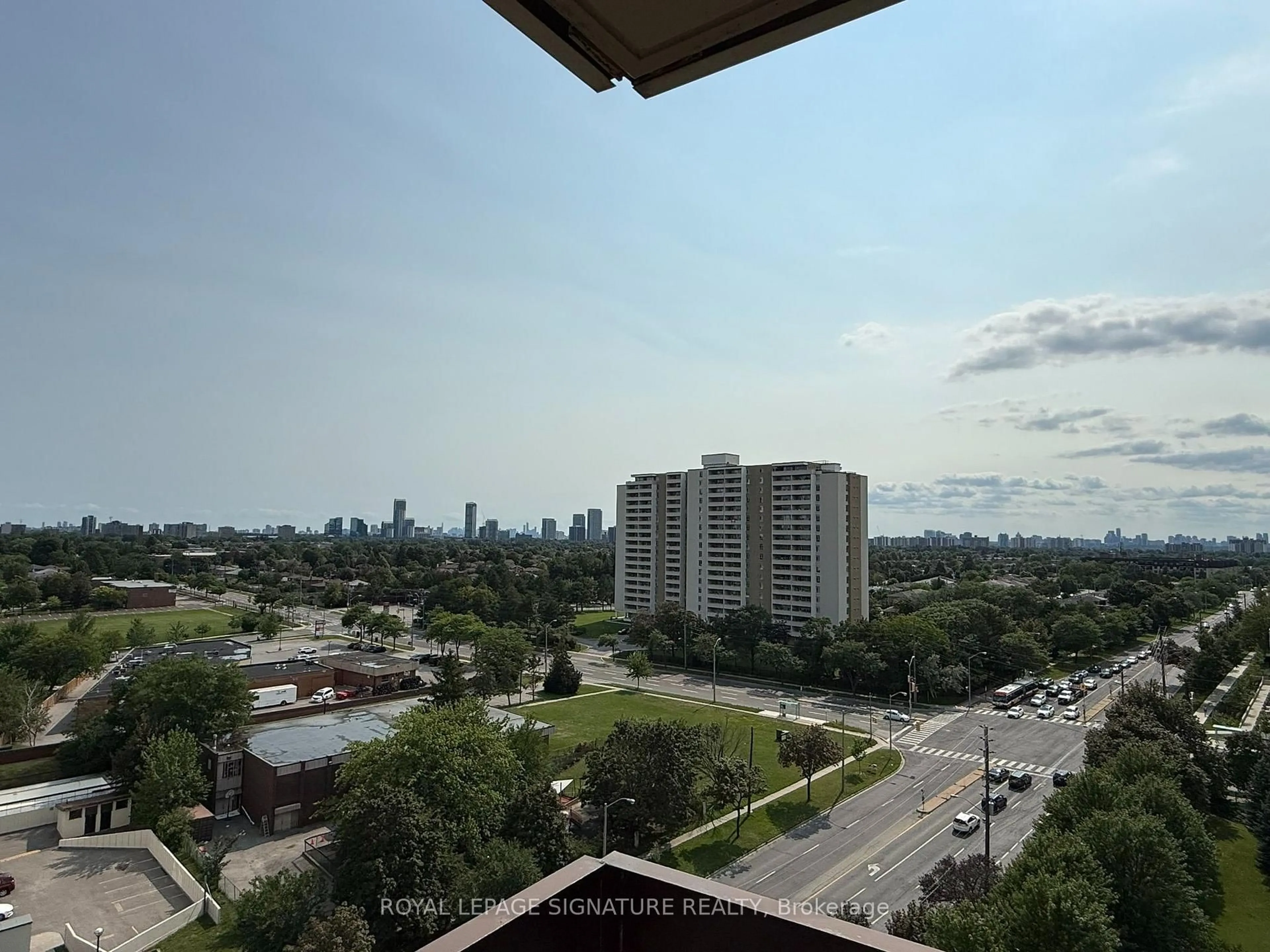 Balcony in the apartment, city buildings view from balcony for 65 Huntingdale Blvd #1402, Toronto Ontario M1W 2P1