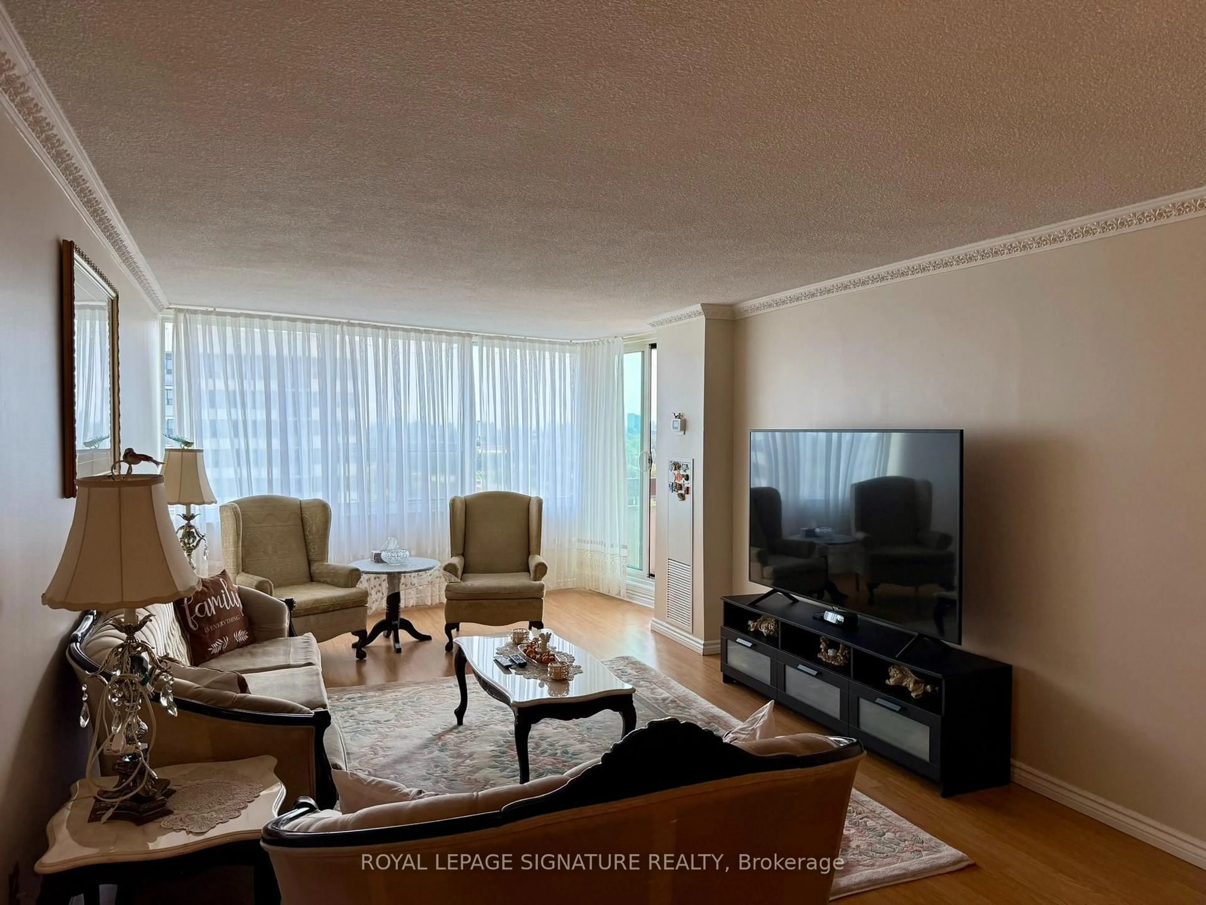 Living room with furniture, unknown for 65 Huntingdale Blvd #1402, Toronto Ontario M1W 2P1