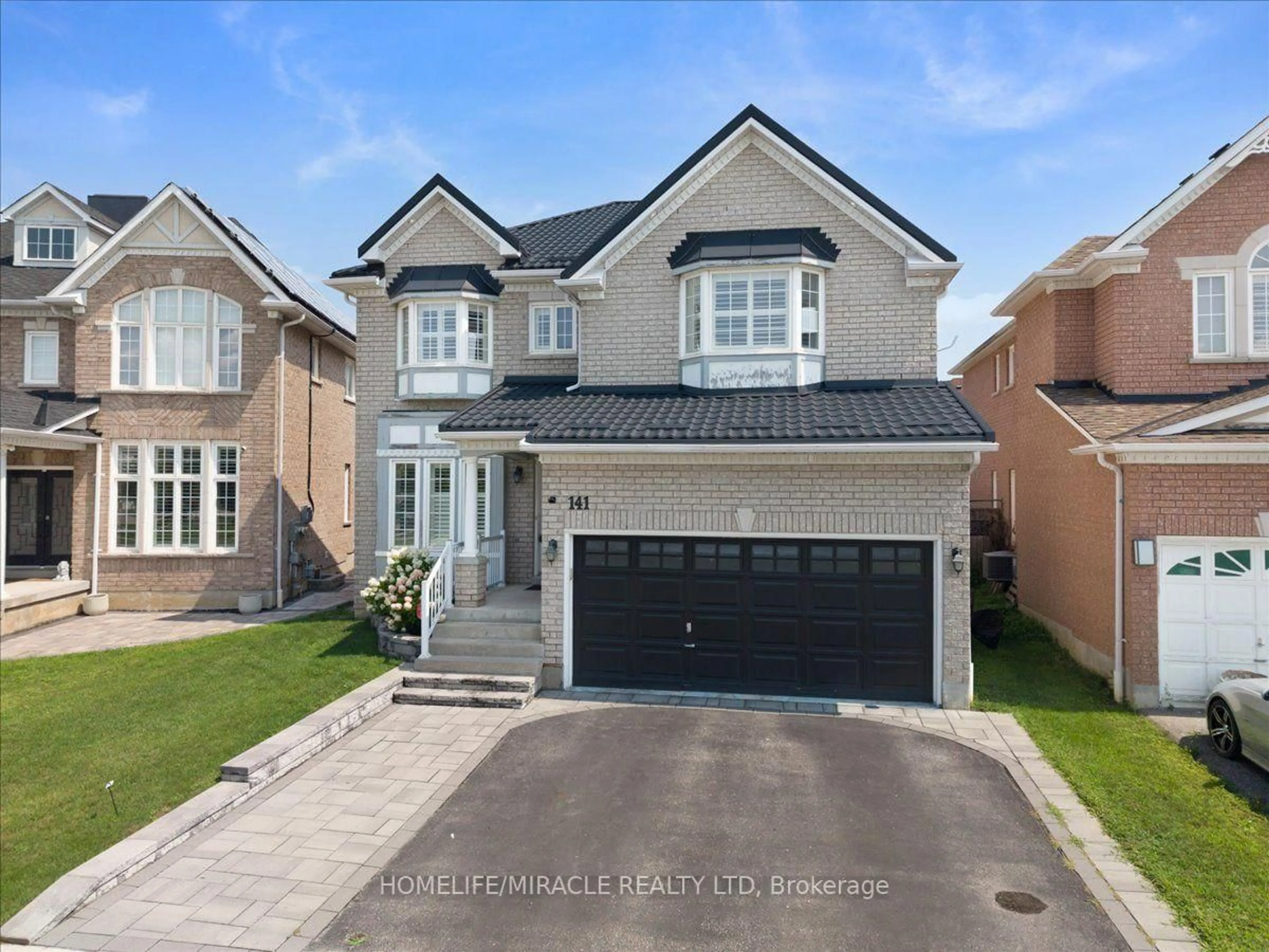 Home with brick exterior material, street for 141 Atherton Ave, Ajax Ontario L1T 0L5