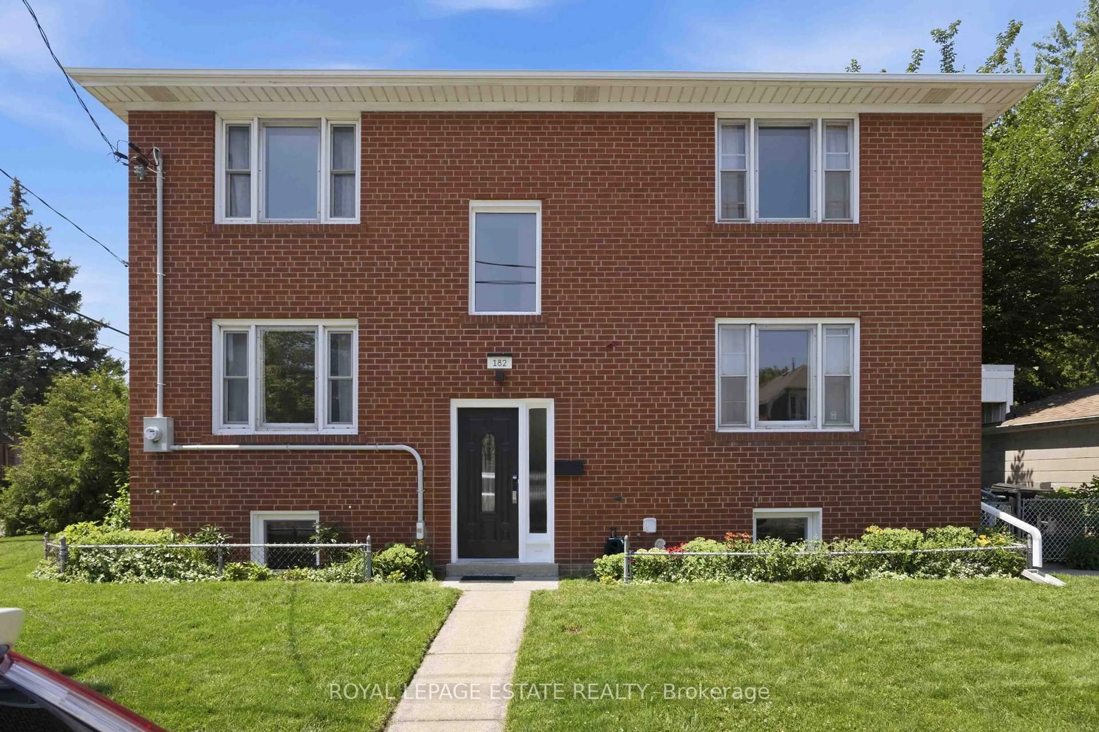 Home with brick exterior material, street for 182 Coleman Ave, Toronto Ontario M4C 1R4