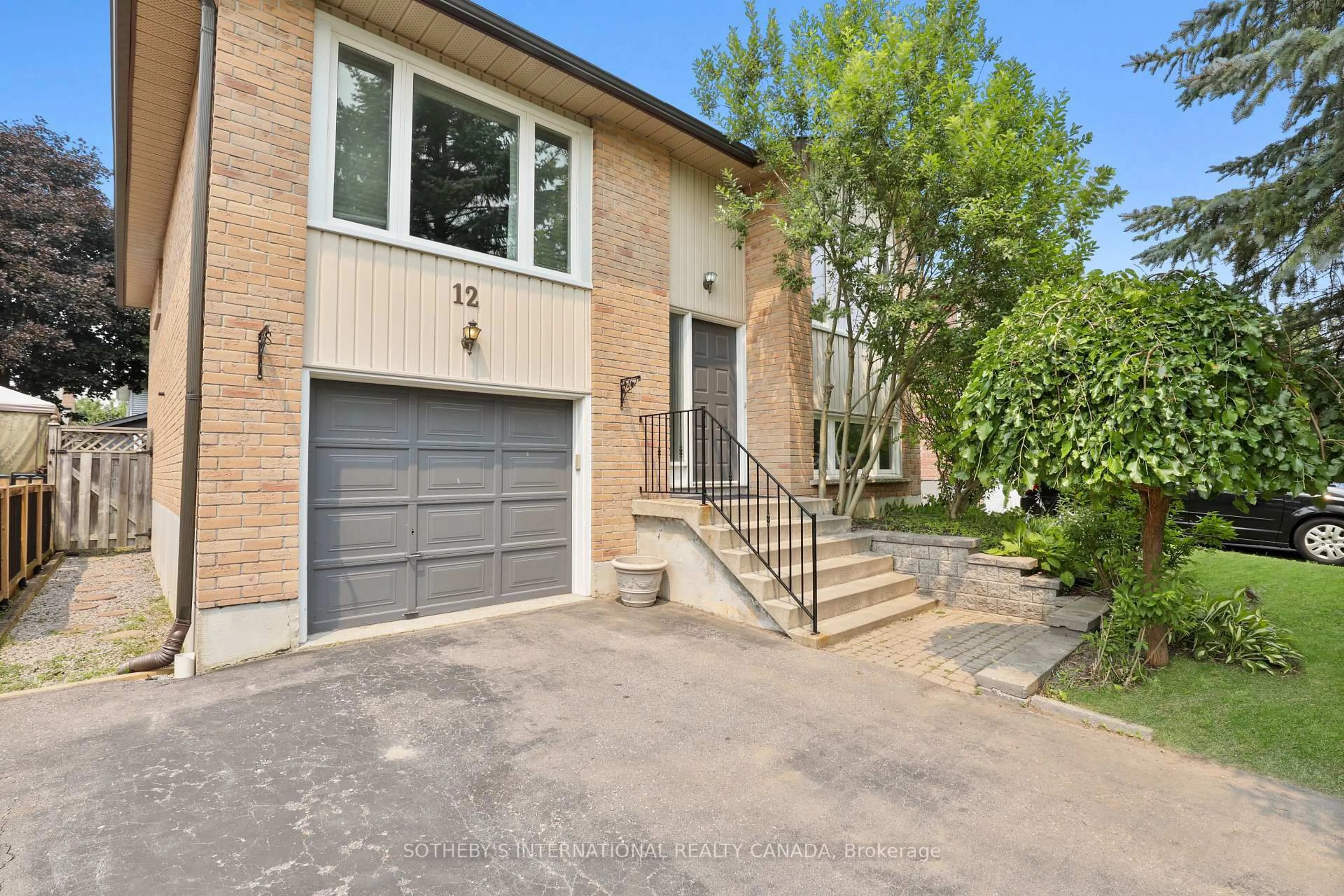 Home with brick exterior material, street for 12 Dunkin Ave, Clarington Ontario L1E 2E3