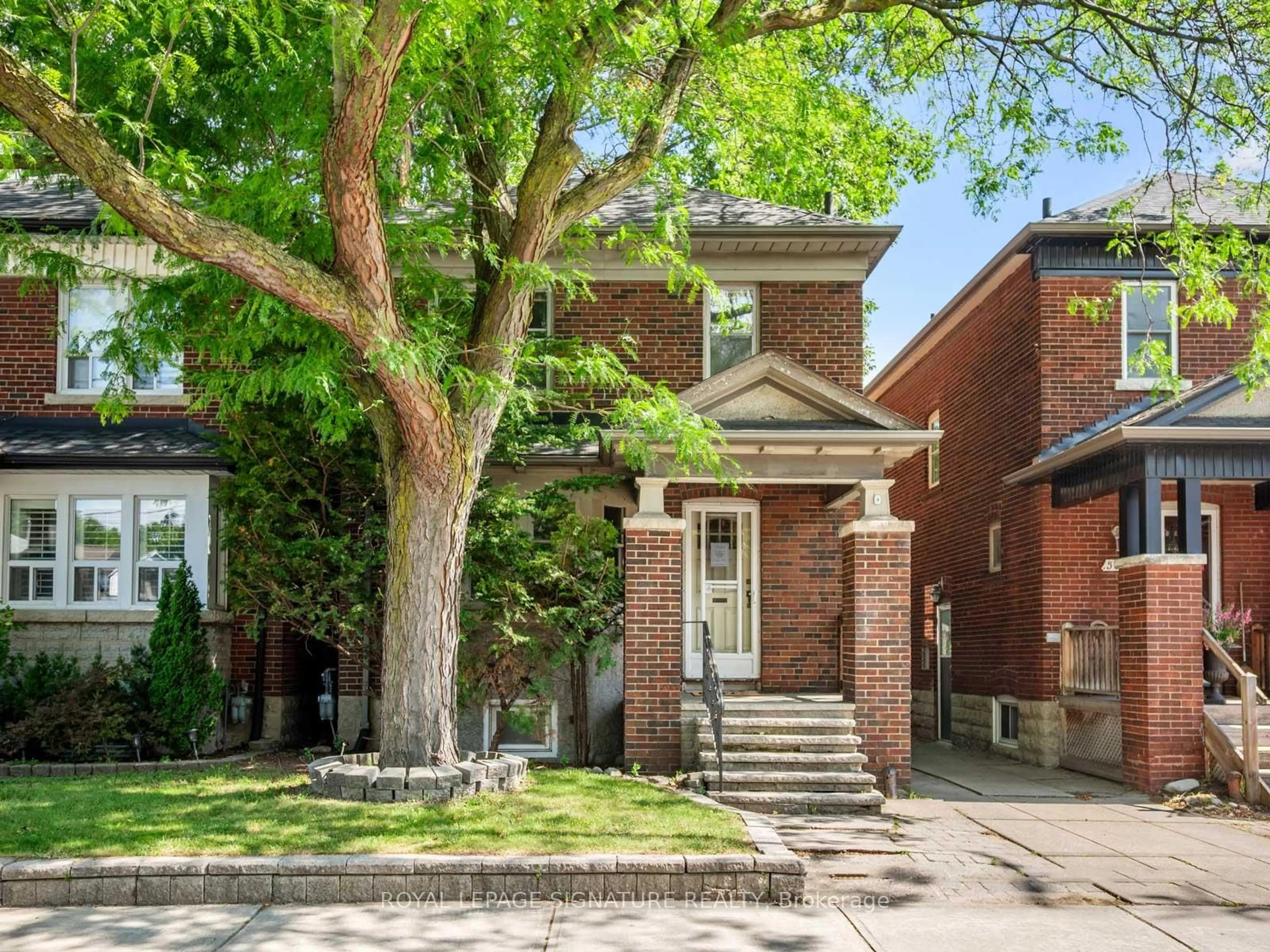 Home with brick exterior material, street for 511 Donlands Ave, Toronto Ontario M4J 3S4